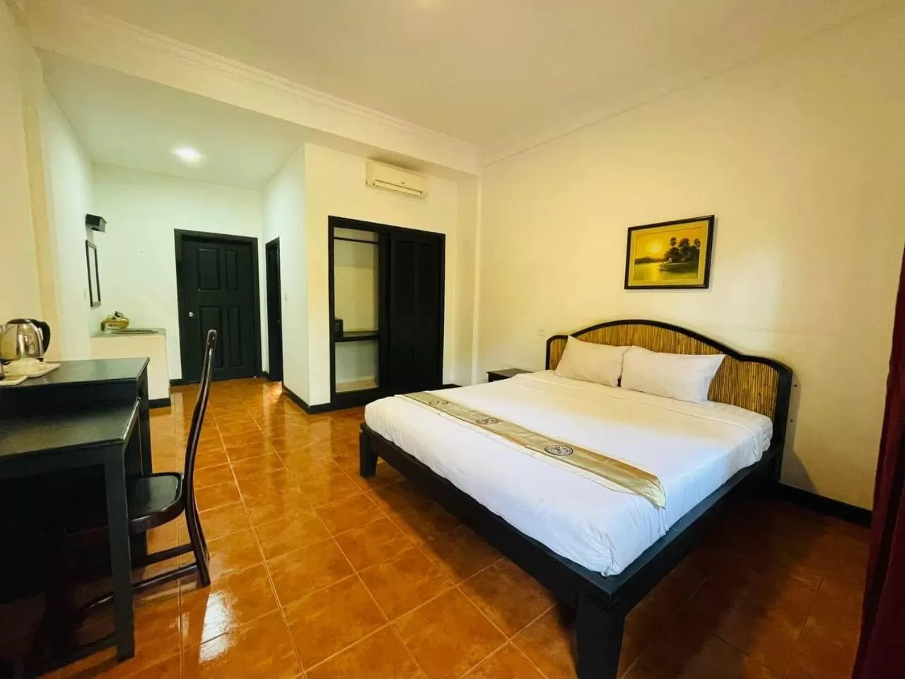 Photo of the whole room, Bed in Angkor Tiger Resort