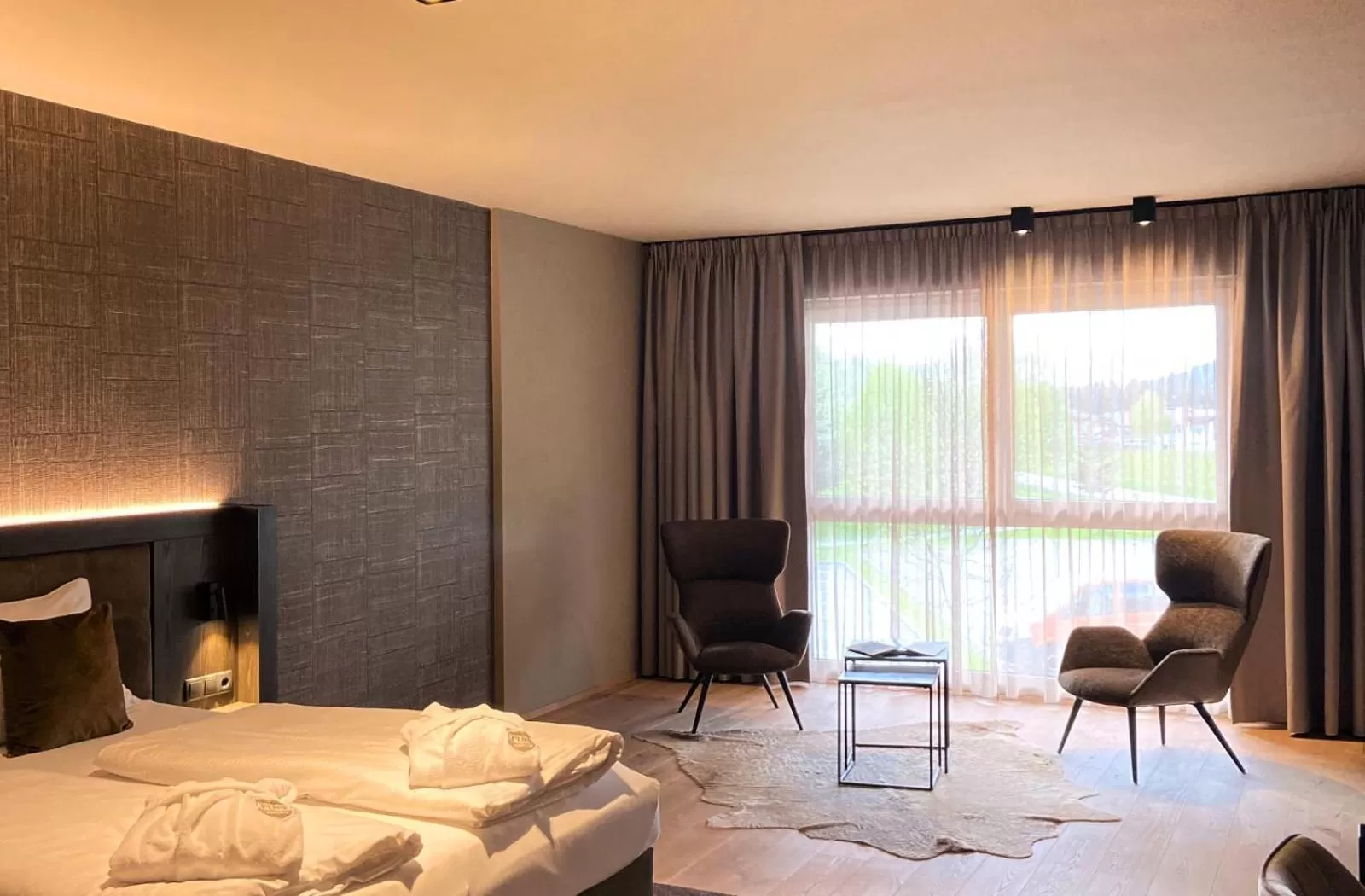 Photo of the whole room, Bed in Berg & Golf Resort Westendorf by ALPS RESORTS