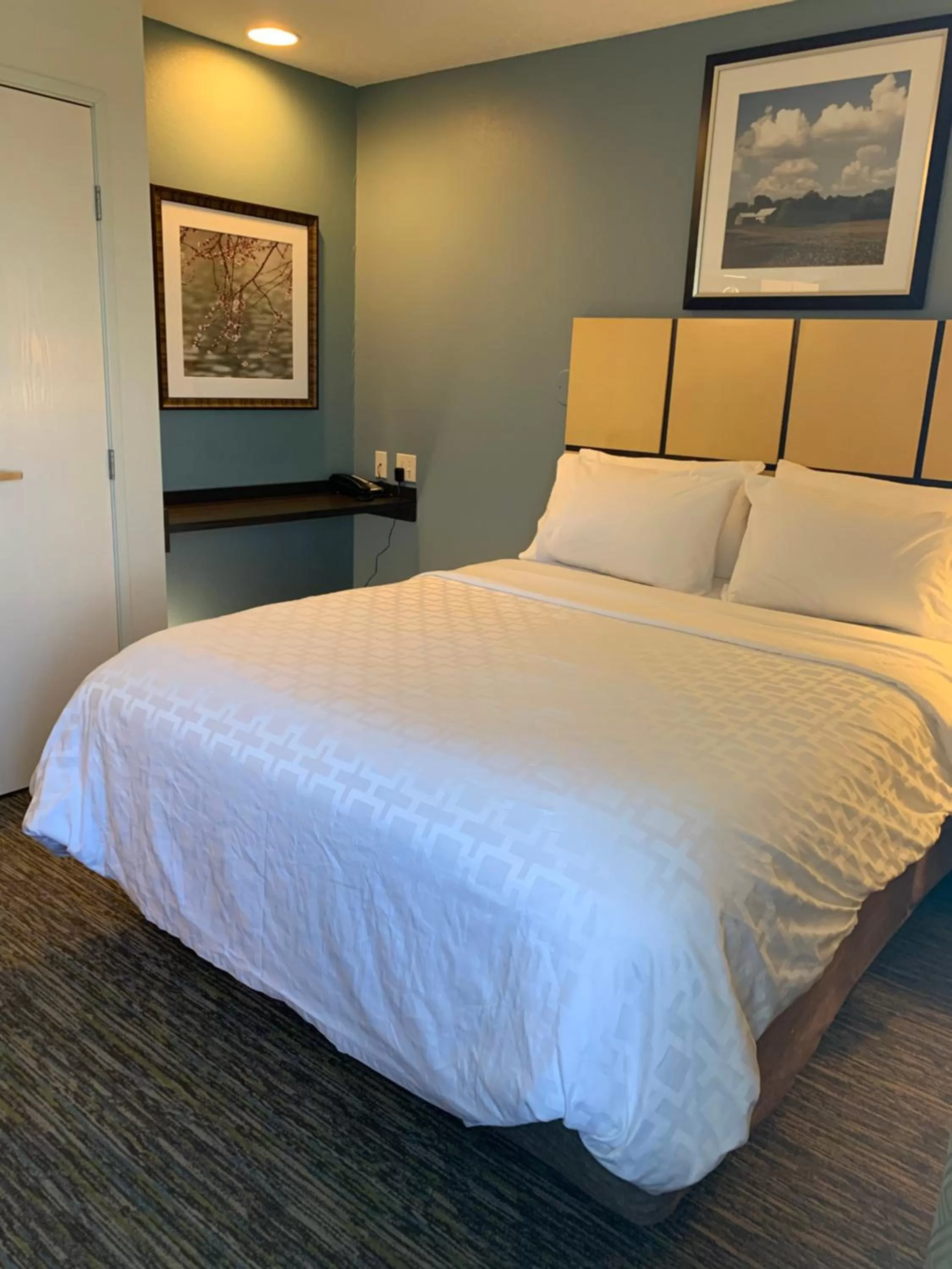 Bed in Candlewood Suites Fargo-North Dakota State University by IHG