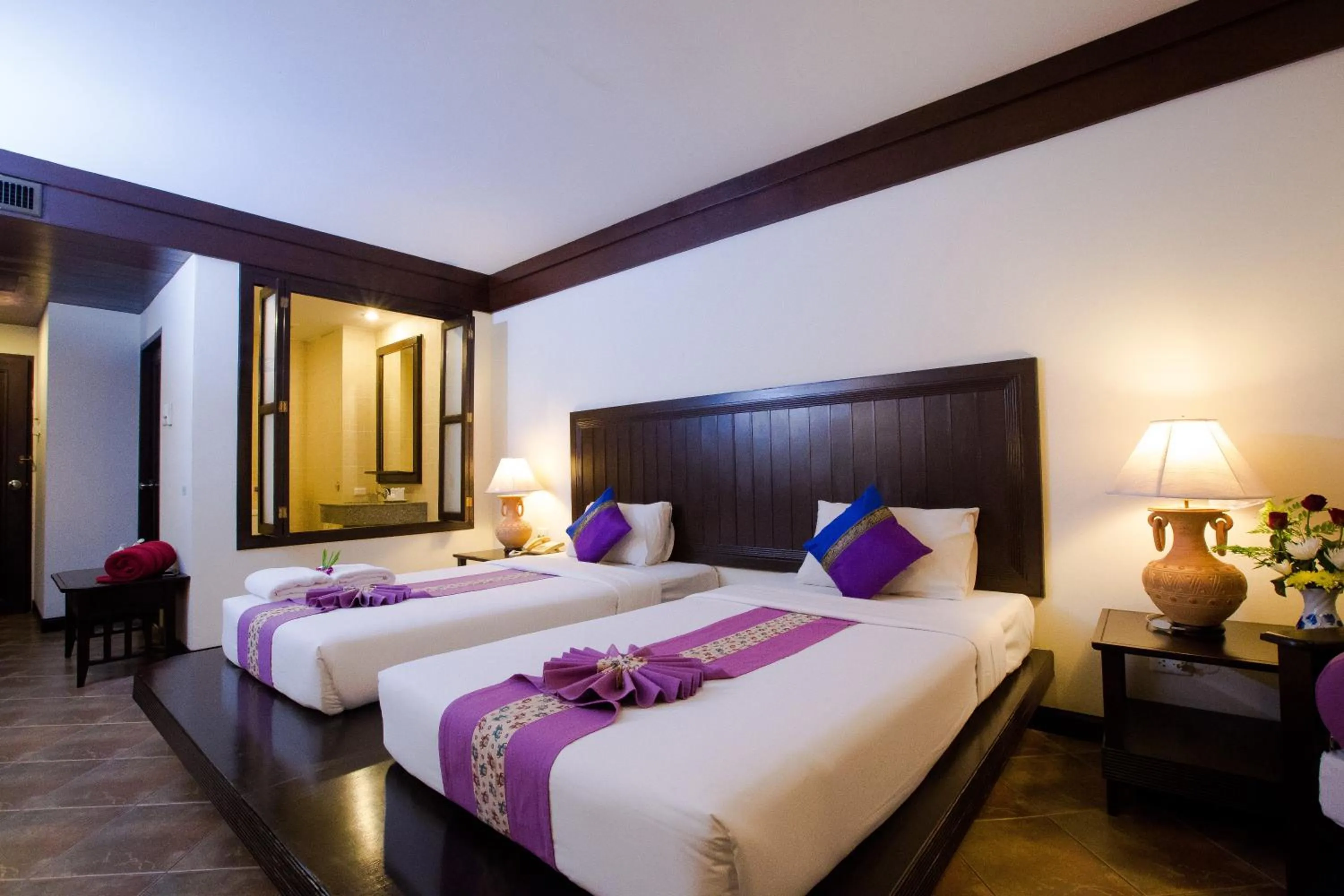 Bed in Kata Poolside Resort SHA Extra Plus