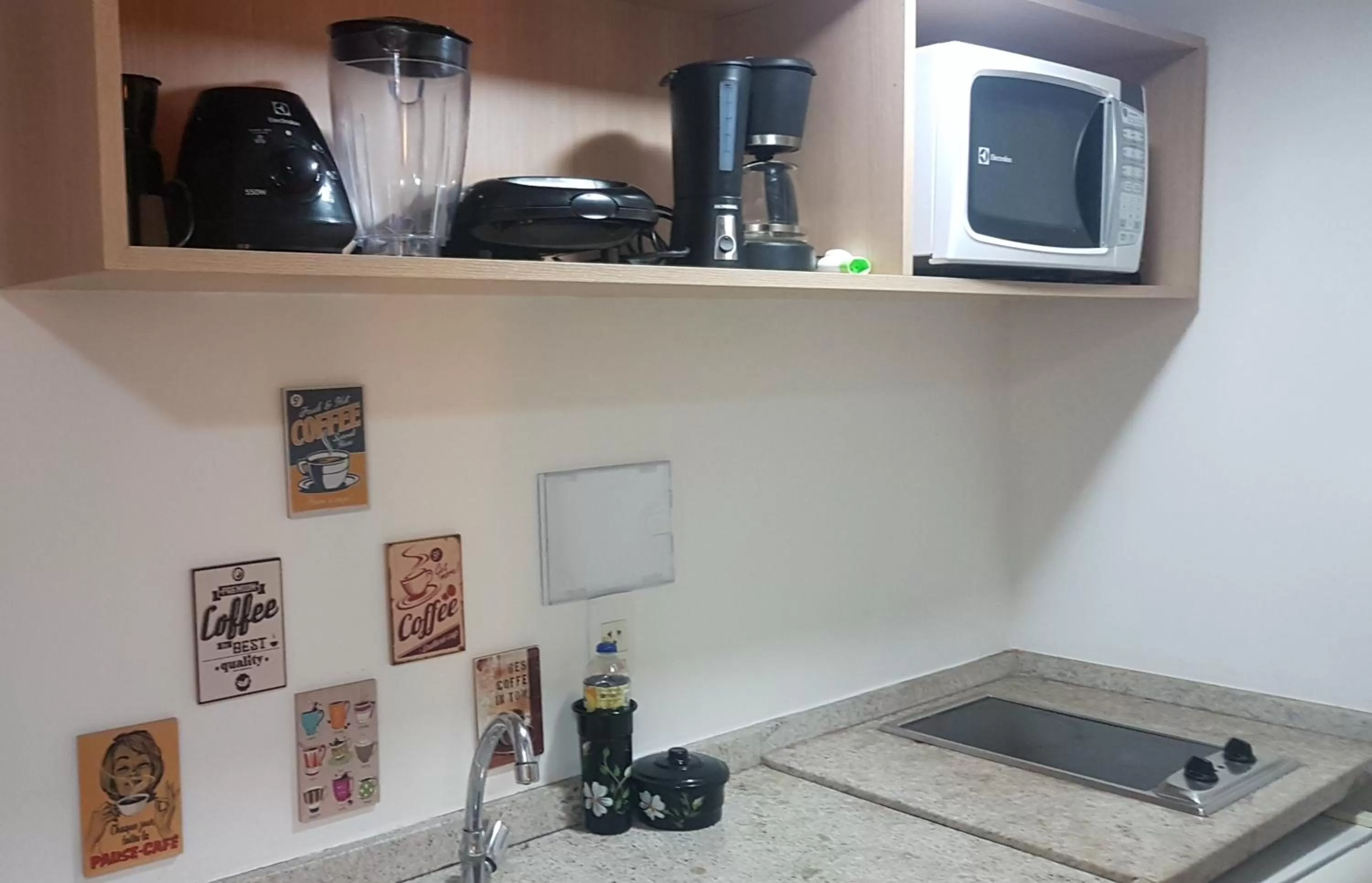 Communal kitchen in Flat Manaus