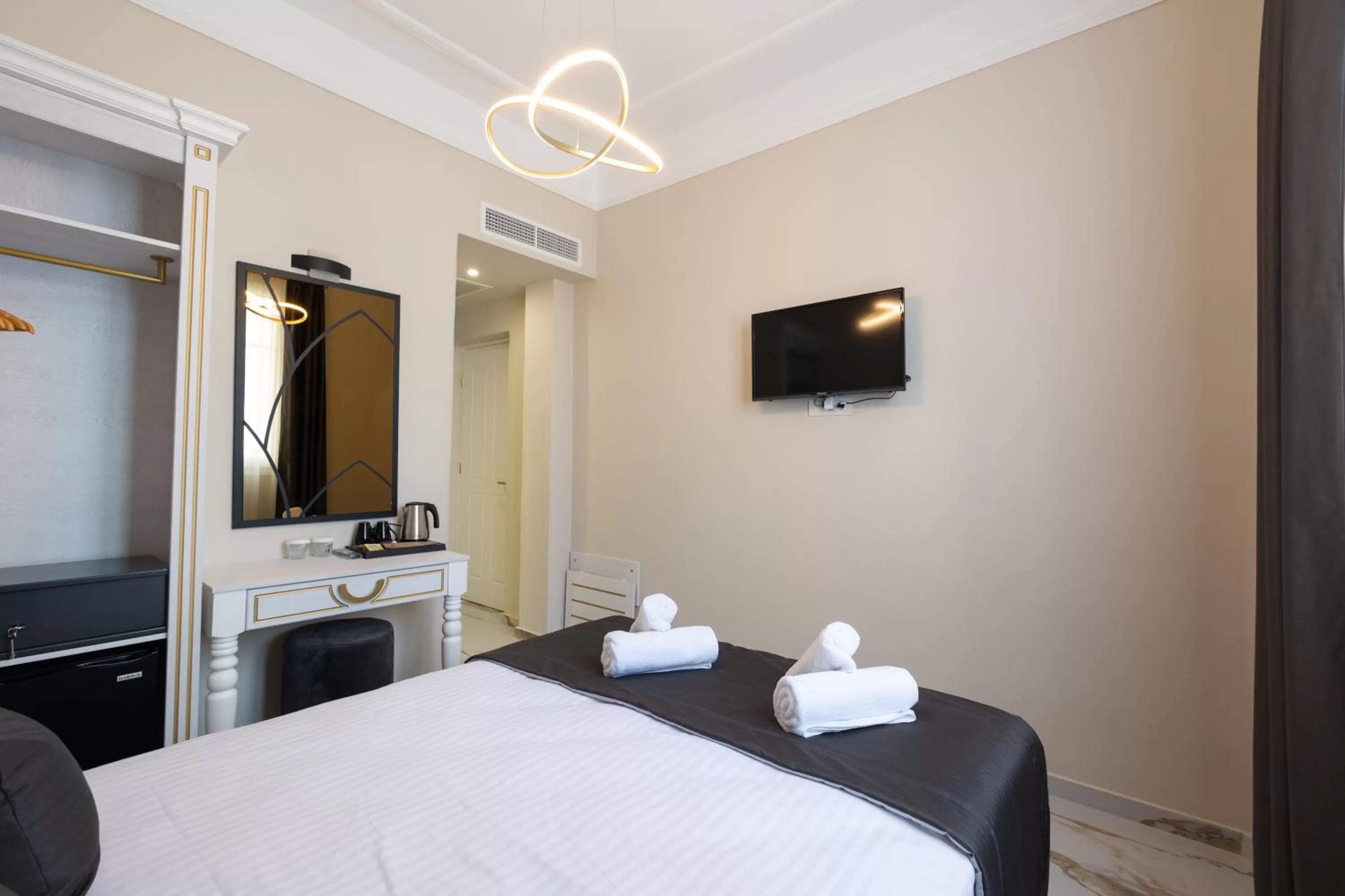 Bed in Modern Revival Luxury Hotel