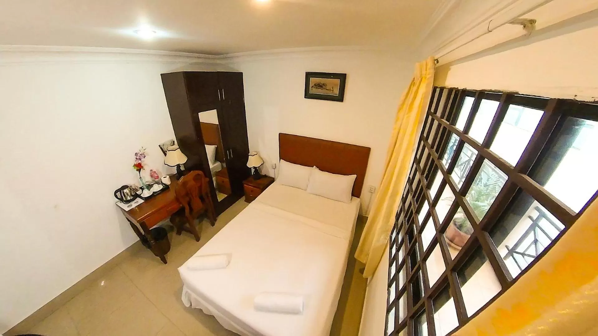 Bed in Riverside Hotel Phnom Penh