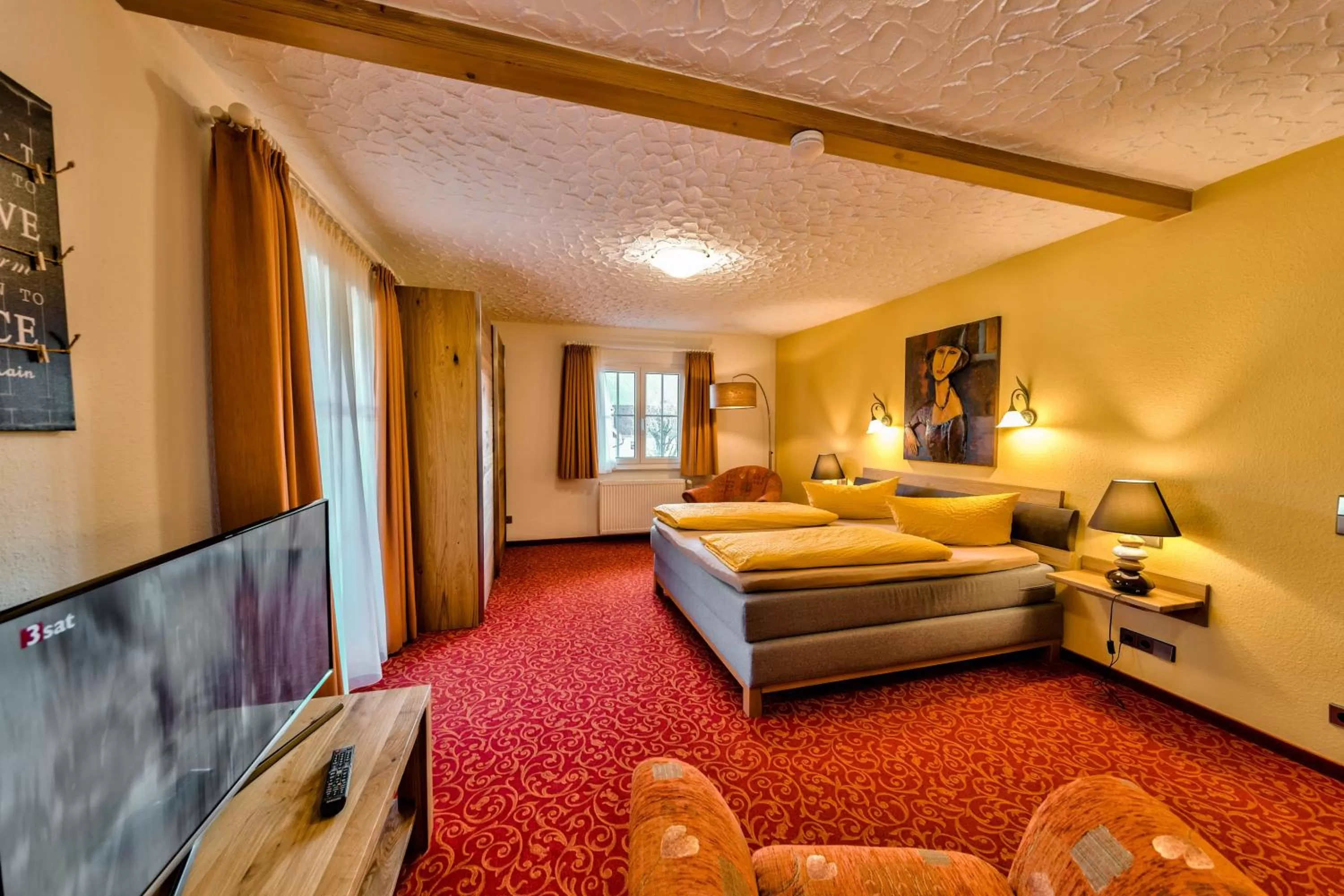 Photo of the whole room, Bed in Hotel Sonneneck Titisee -Adults Only-