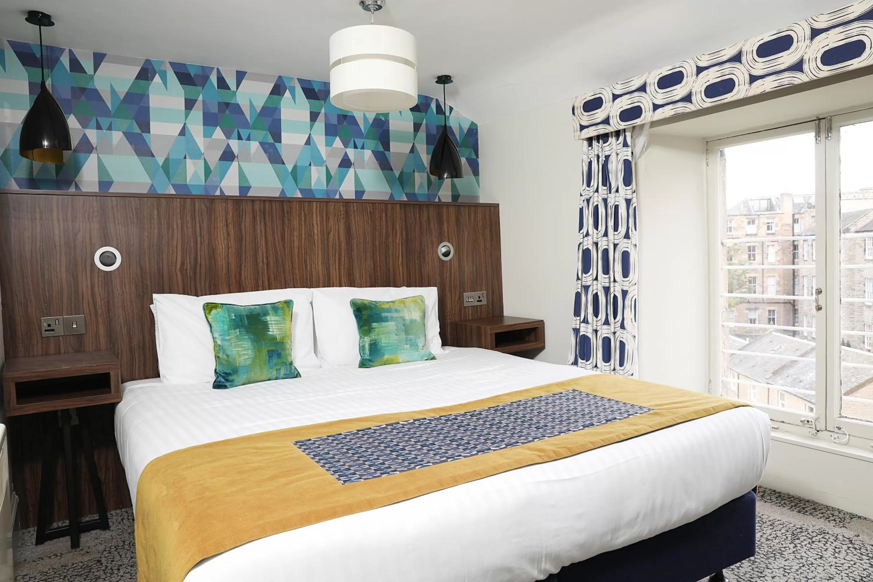 Bed in Cairn Hotel & Apartments