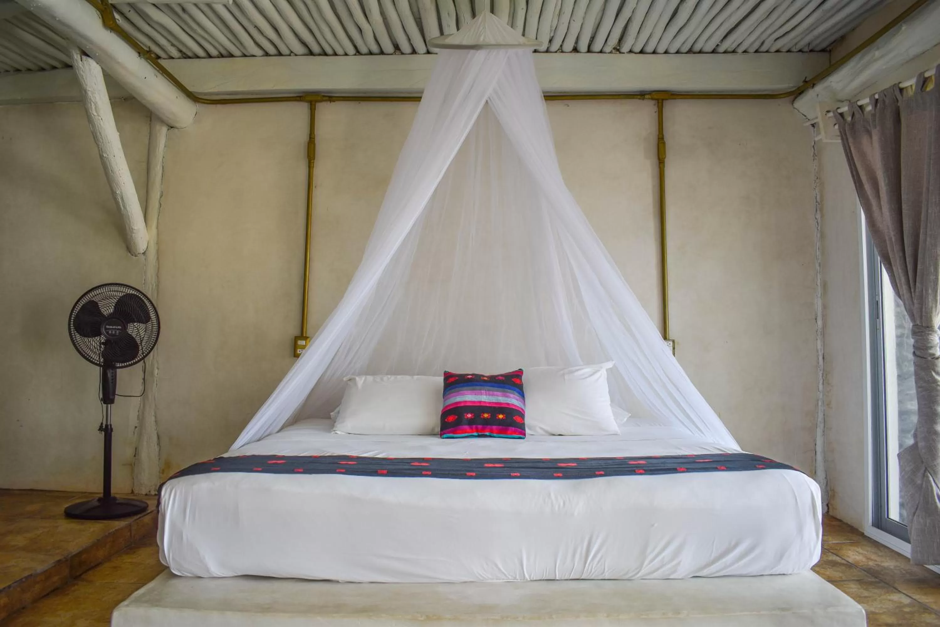 Bed in Posada Lamar Tulum Beach Front and Pool