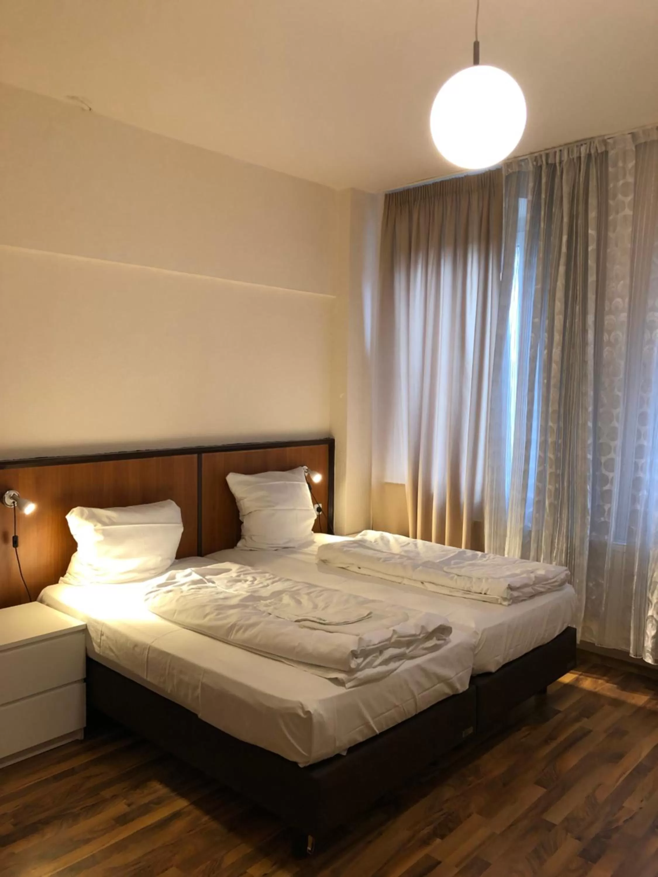 Bed in Hotel Poseidon