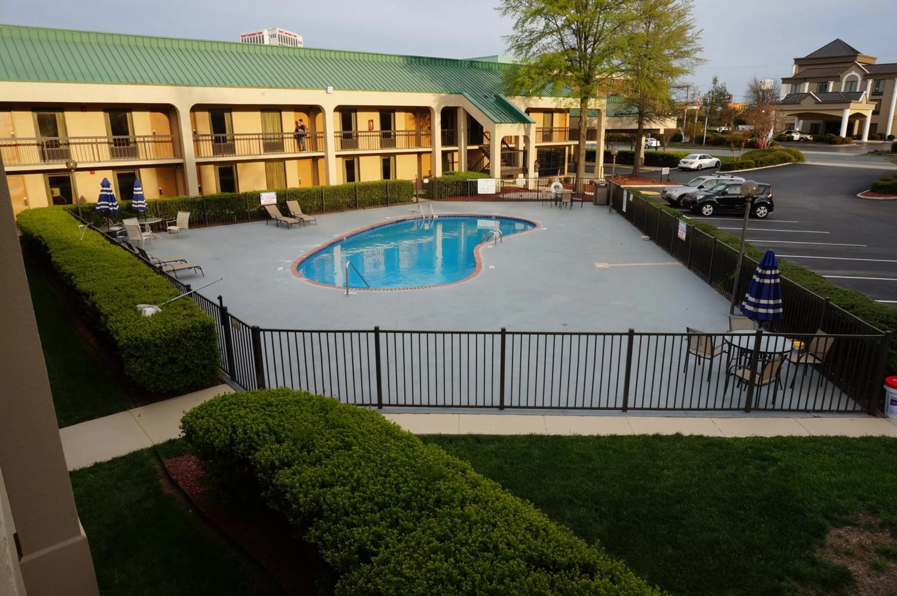 Swimming pool in Howard Johnson by Wyndham Greensboro Near the Coliseum