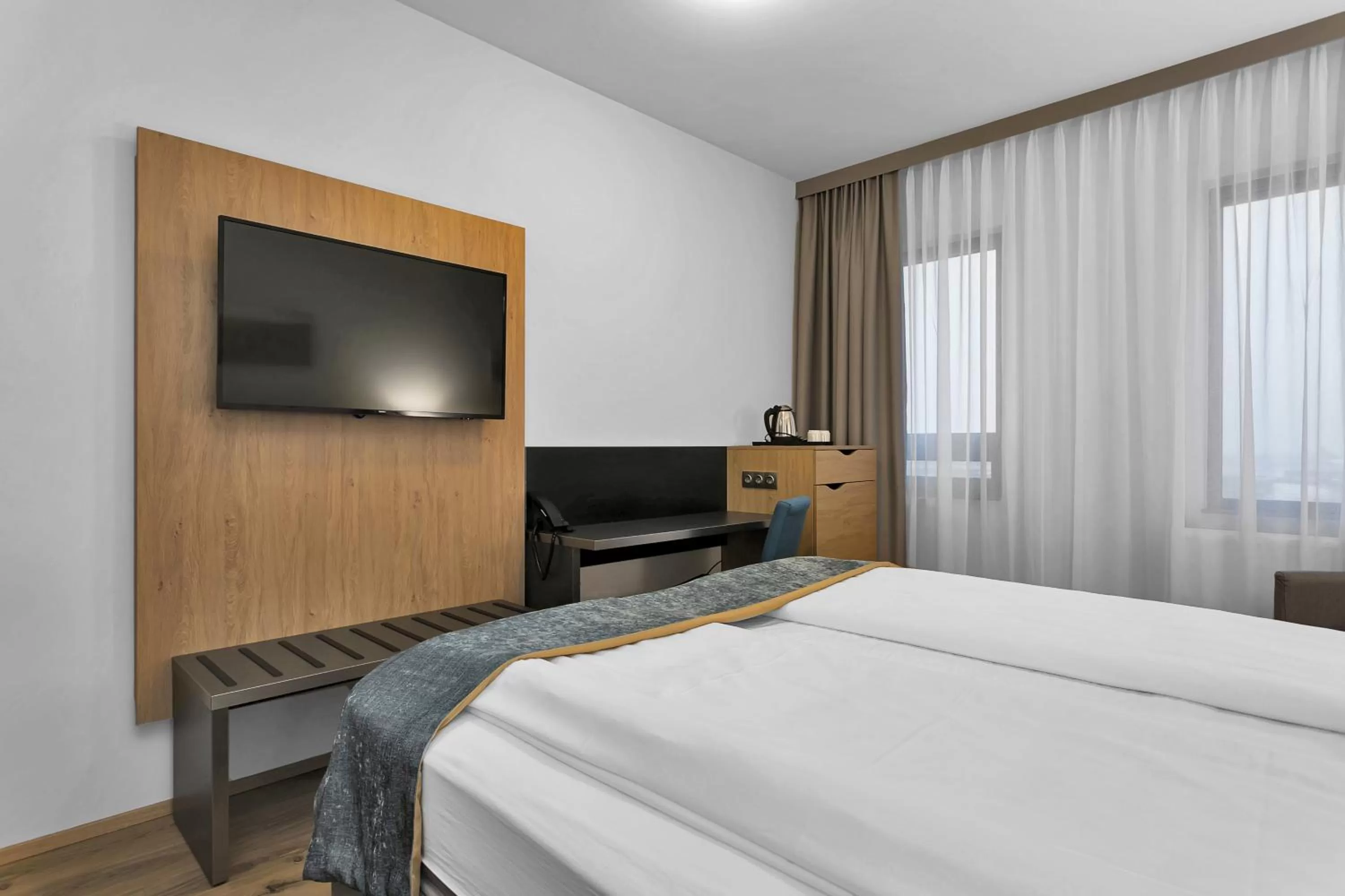 Bed in Aurora Hotel at Reykjavik-Keflavik Airport Terminal KEF