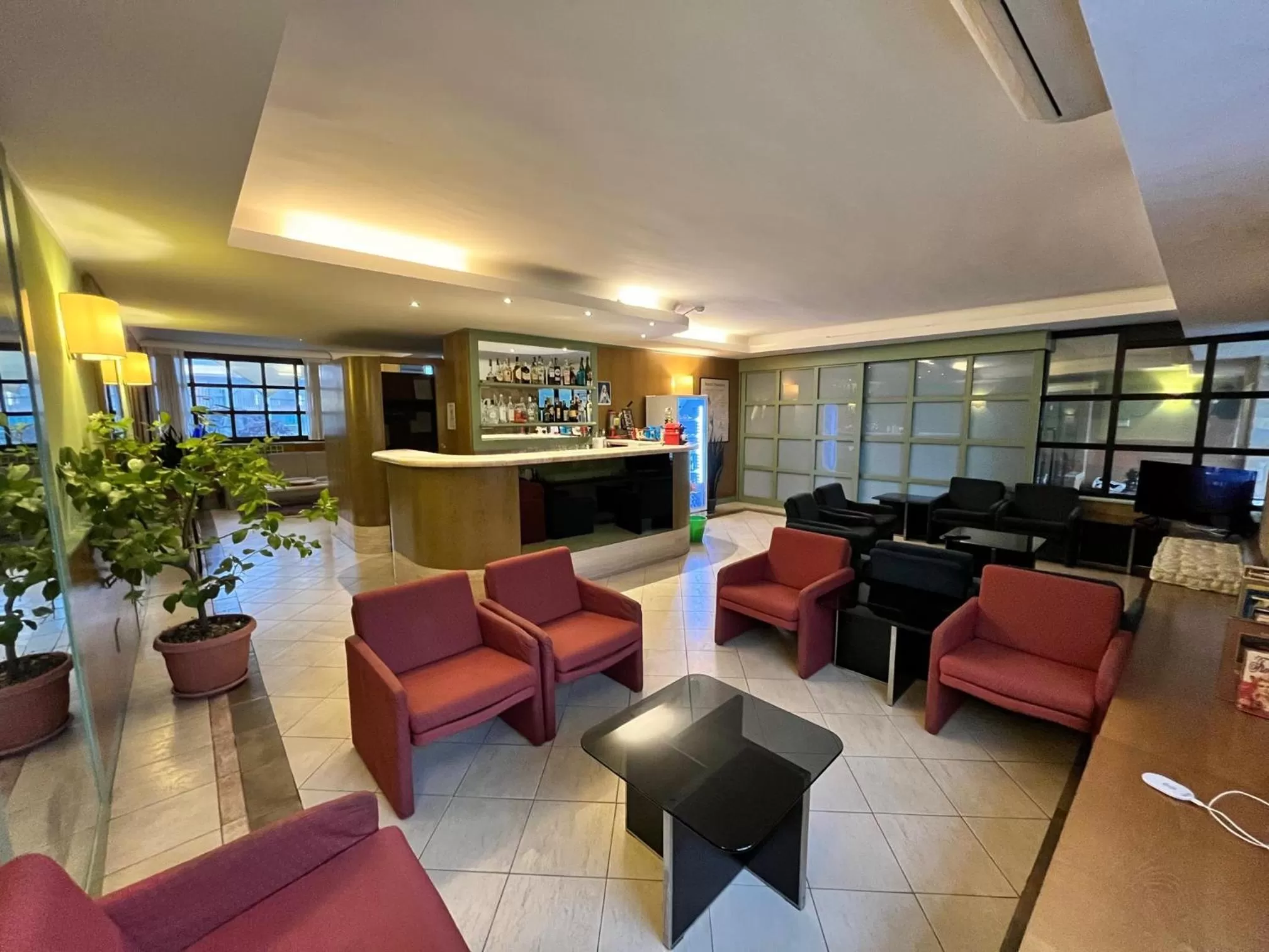 Communal lounge/ TV room in Hotel La Goletta