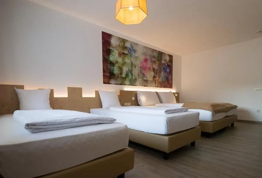 Photo of the whole room, Bed in Family Hotel Schloss Rosenegg