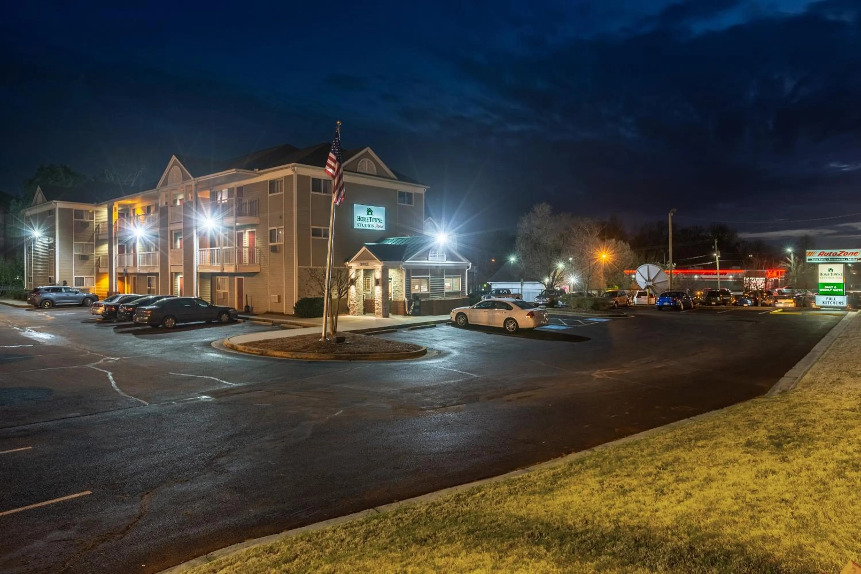 Property building in HomeTowne Studios by Red Roof Gainesville, GA