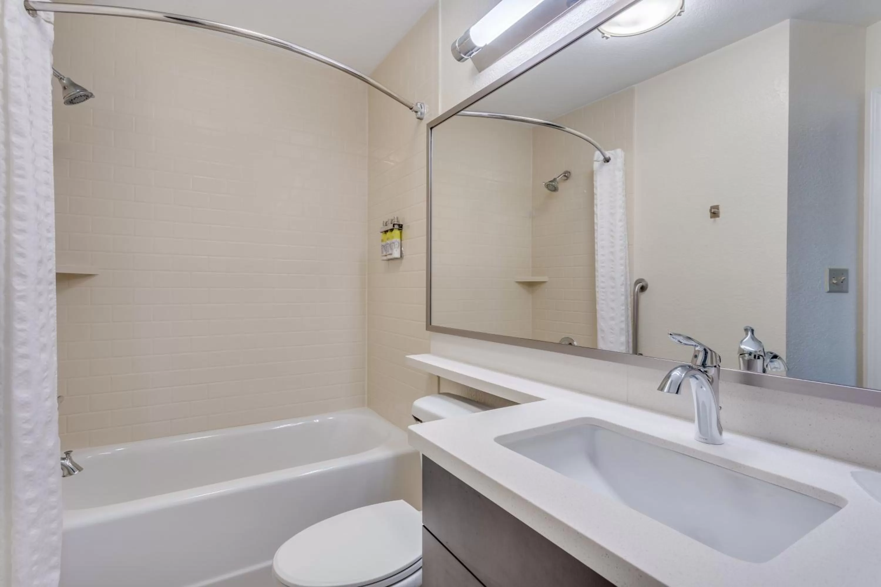 Bathroom in Candlewood Suites Secaucus by IHG
