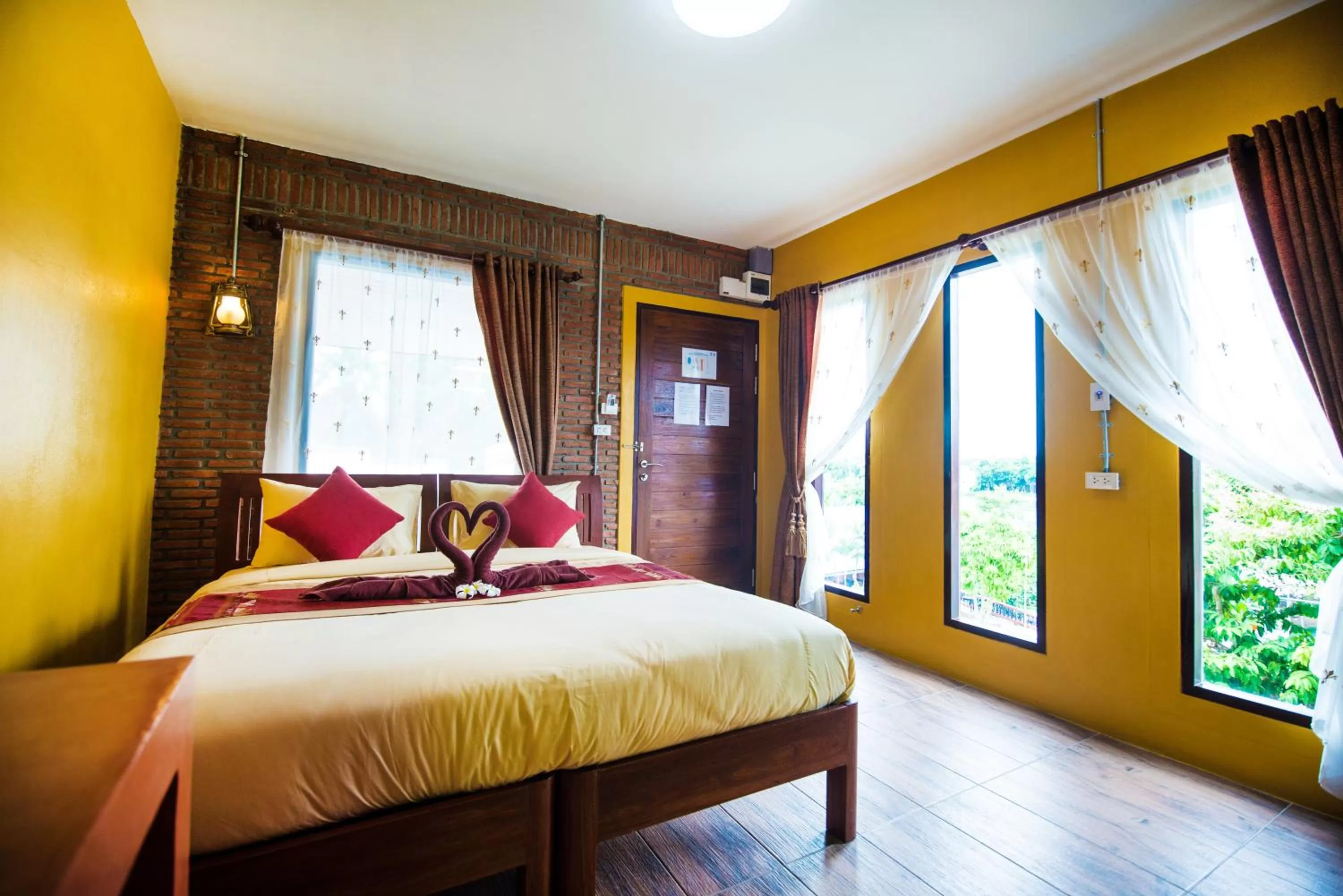 Photo of the whole room, Bed in Pongphen Guesthouse - SHA Plus Certified