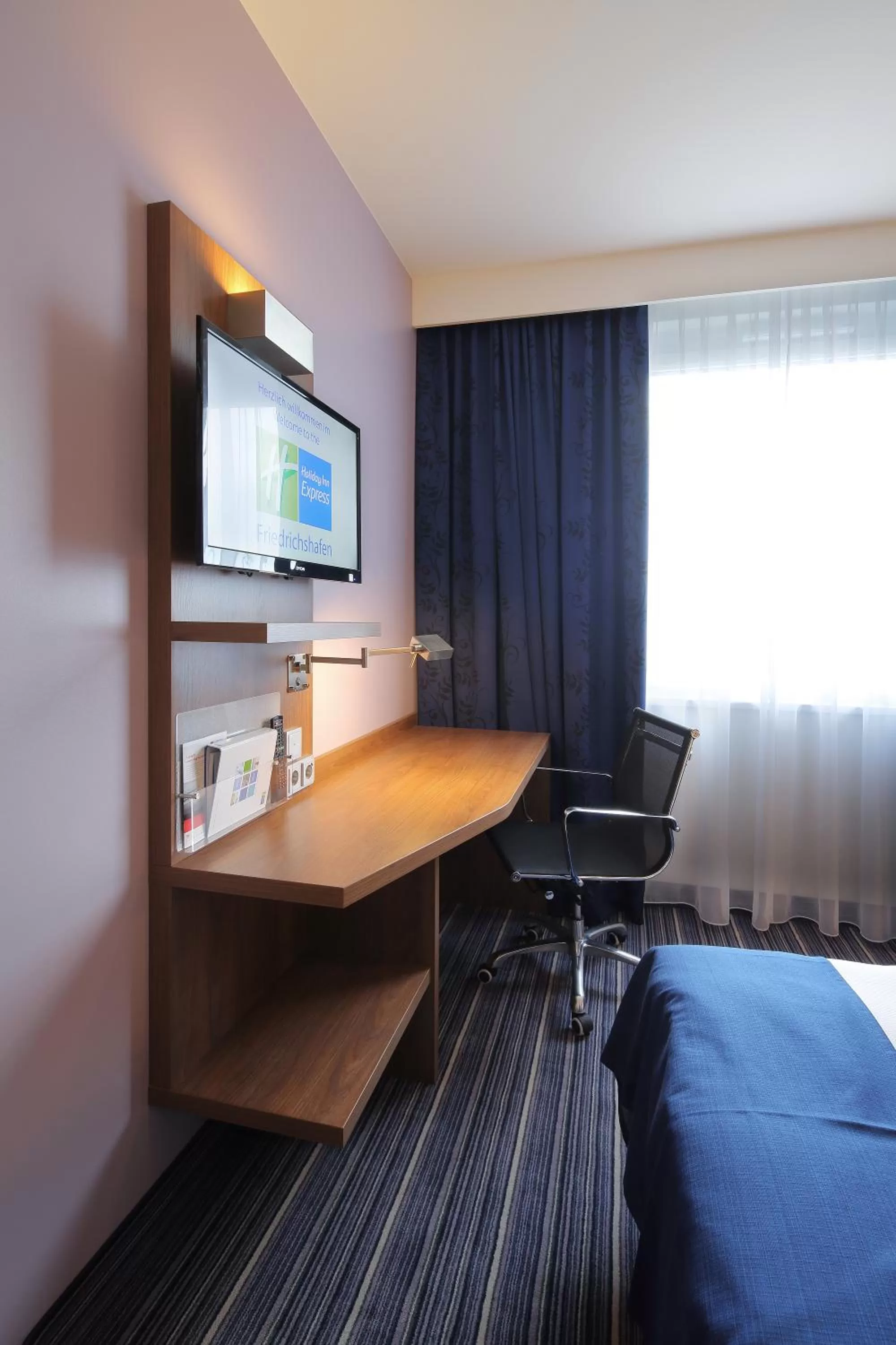 Photo of the whole room, Bed in Holiday Inn Express Friedrichshafen by IHG