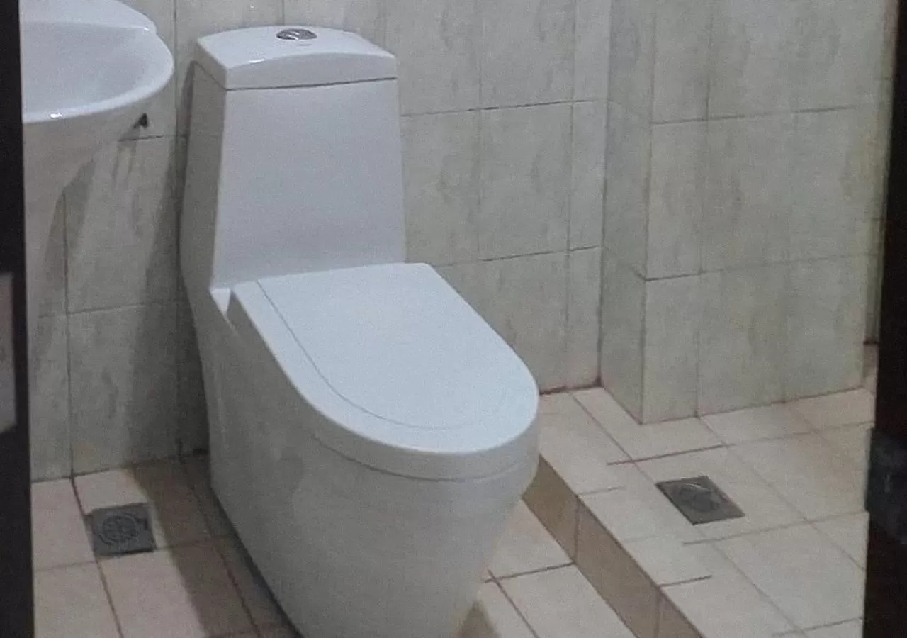 Bathroom in Sky Garden Hotel by RedDoorz