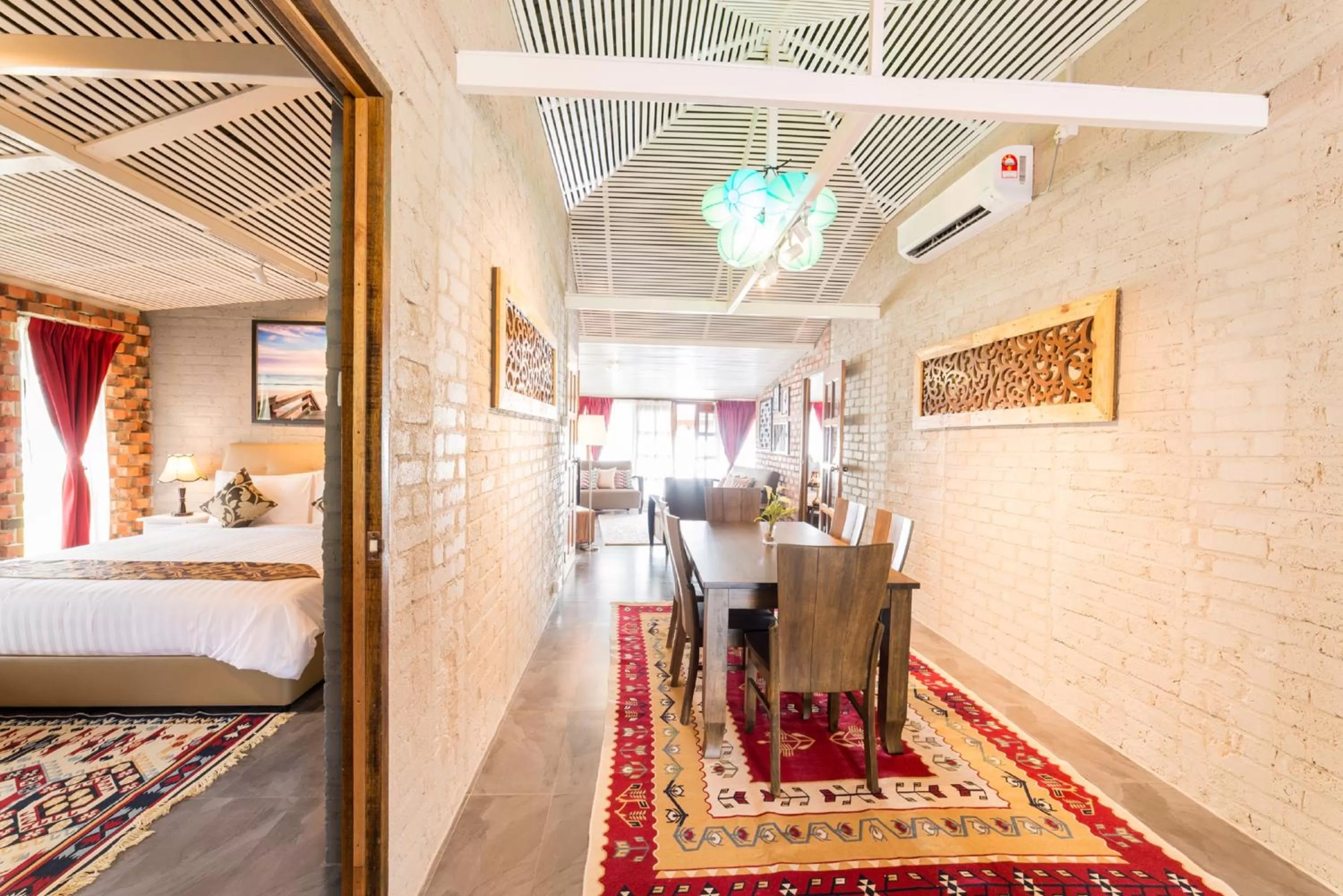 Seating area, Bed in The Ocean Residence Langkawi