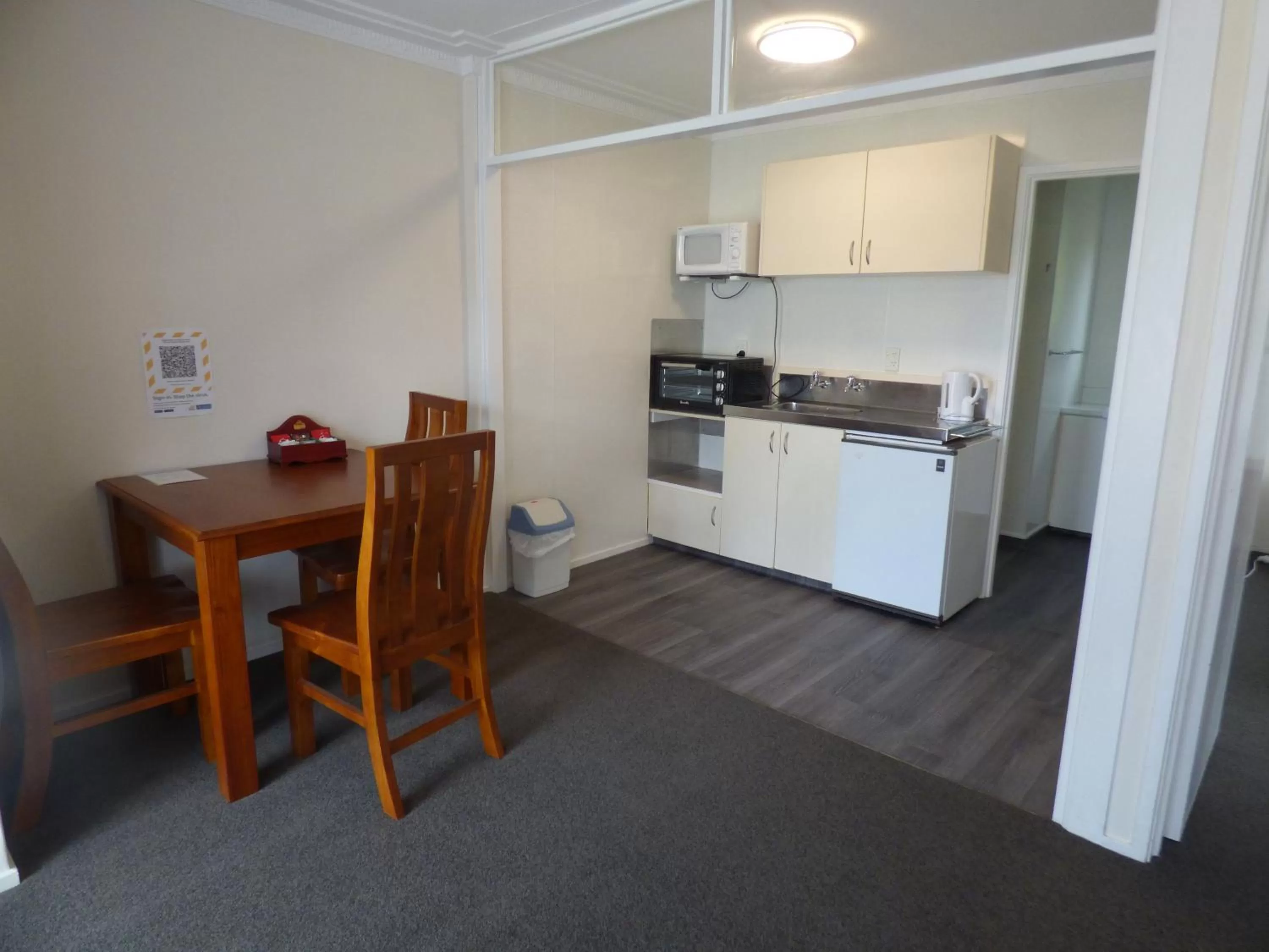 Kitchen or kitchenette in Sahara Motels