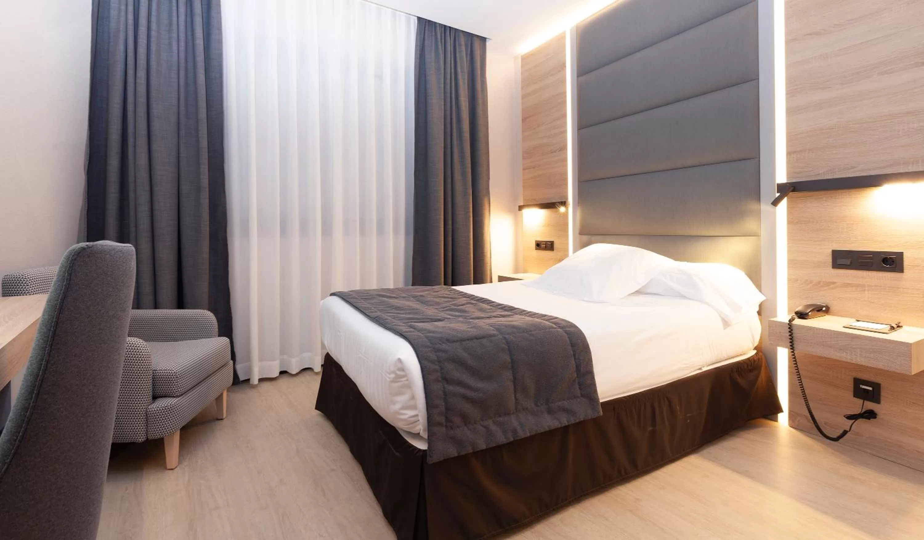 Bed in Hotel Liabeny