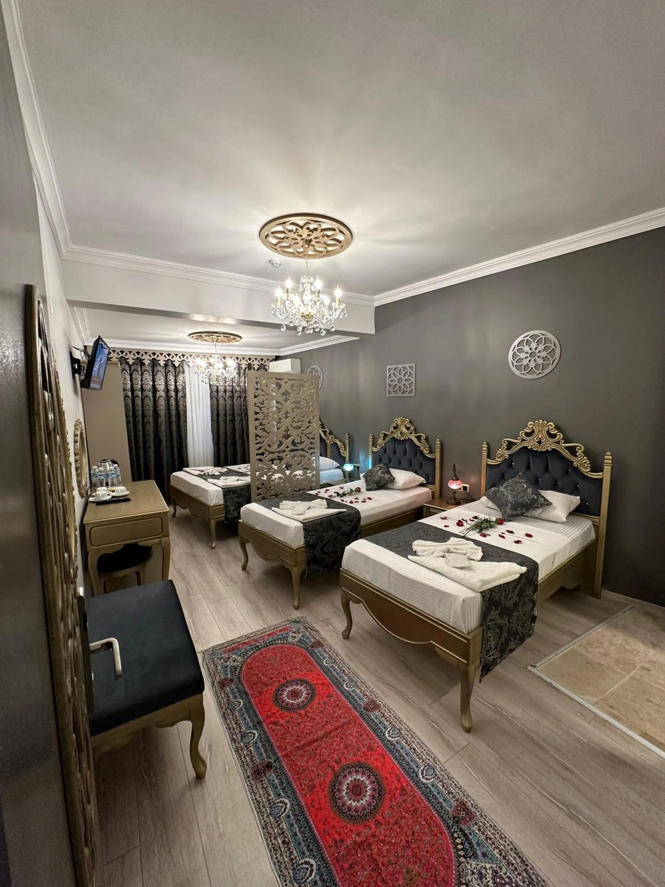 Bed in Ethnica Suites