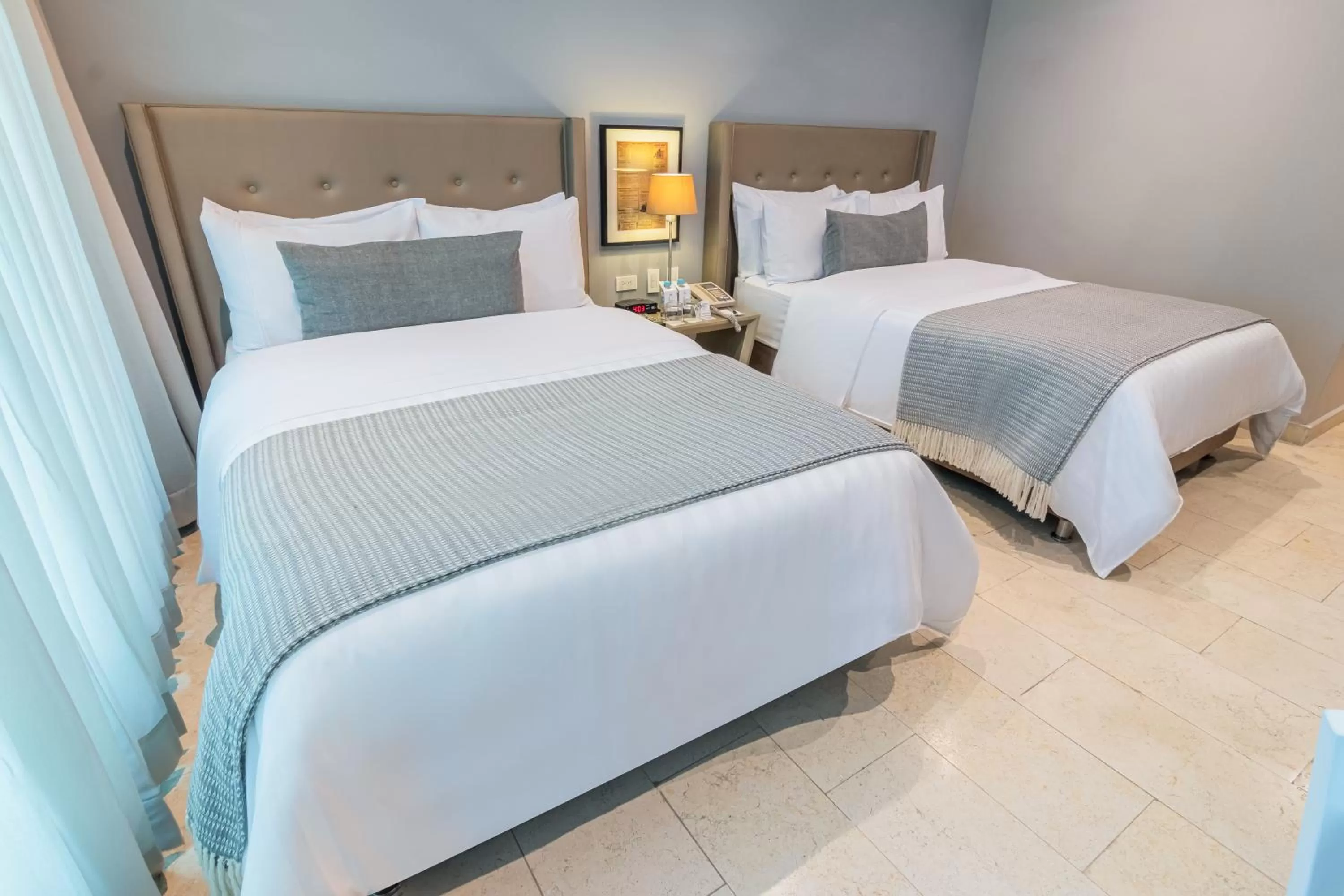 Bed in GHL San Lazaro Art Hotel