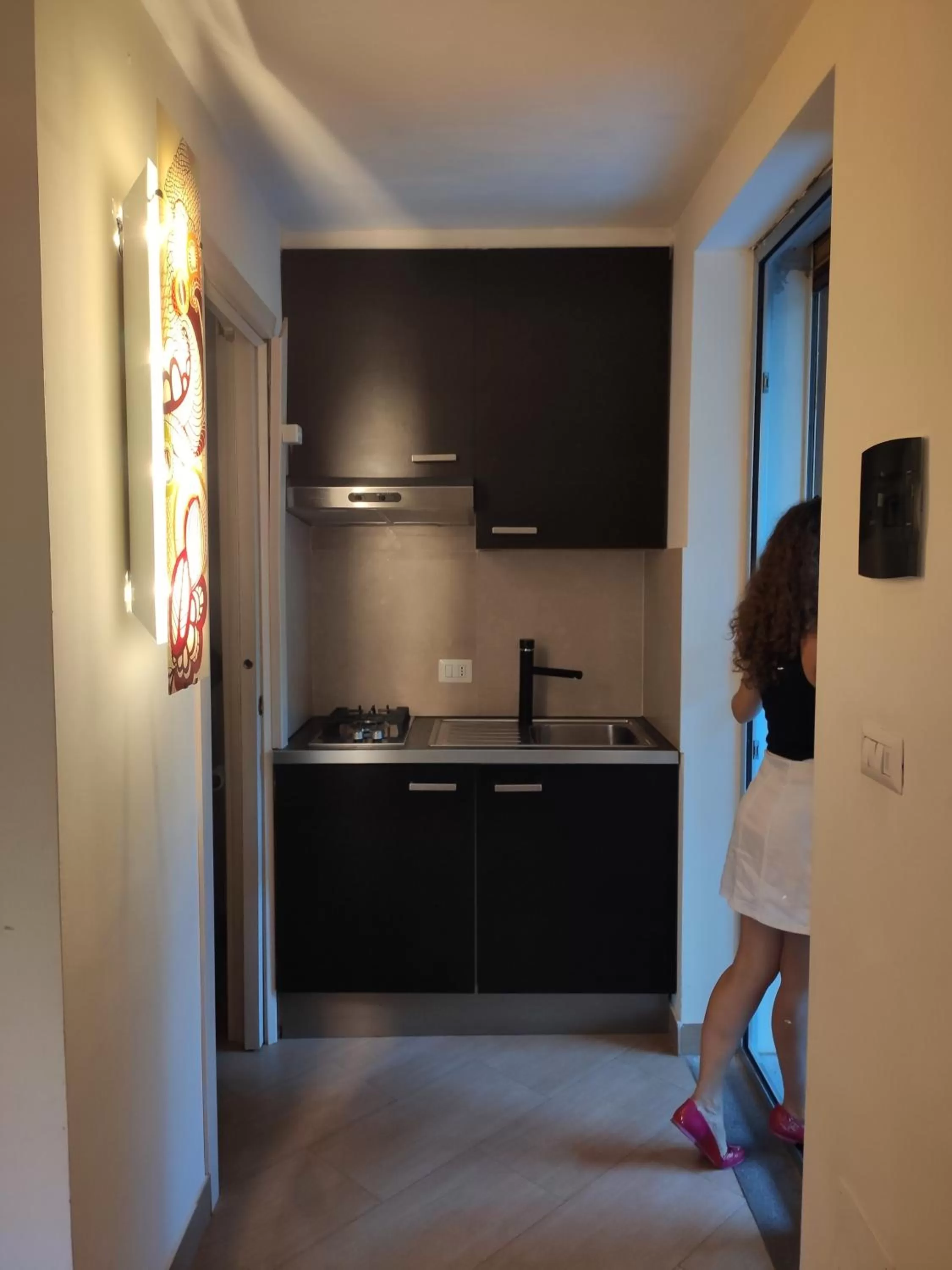 Kitchen or kitchenette in Villa delle Palme