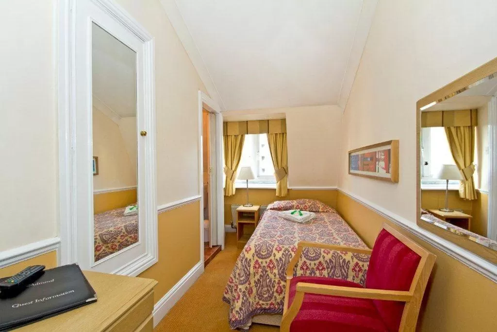 Bed in Admiral Hotel at Park Avenue