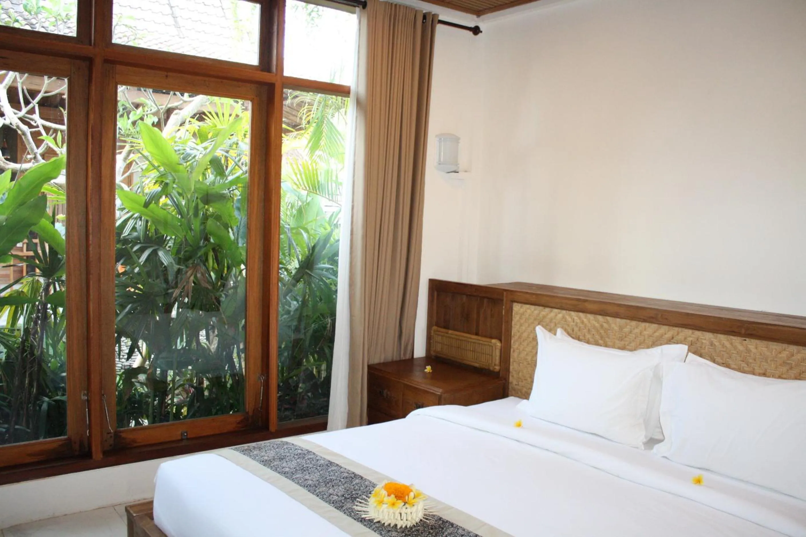 Bed in Graha Sandat Villas by GenuineHost
