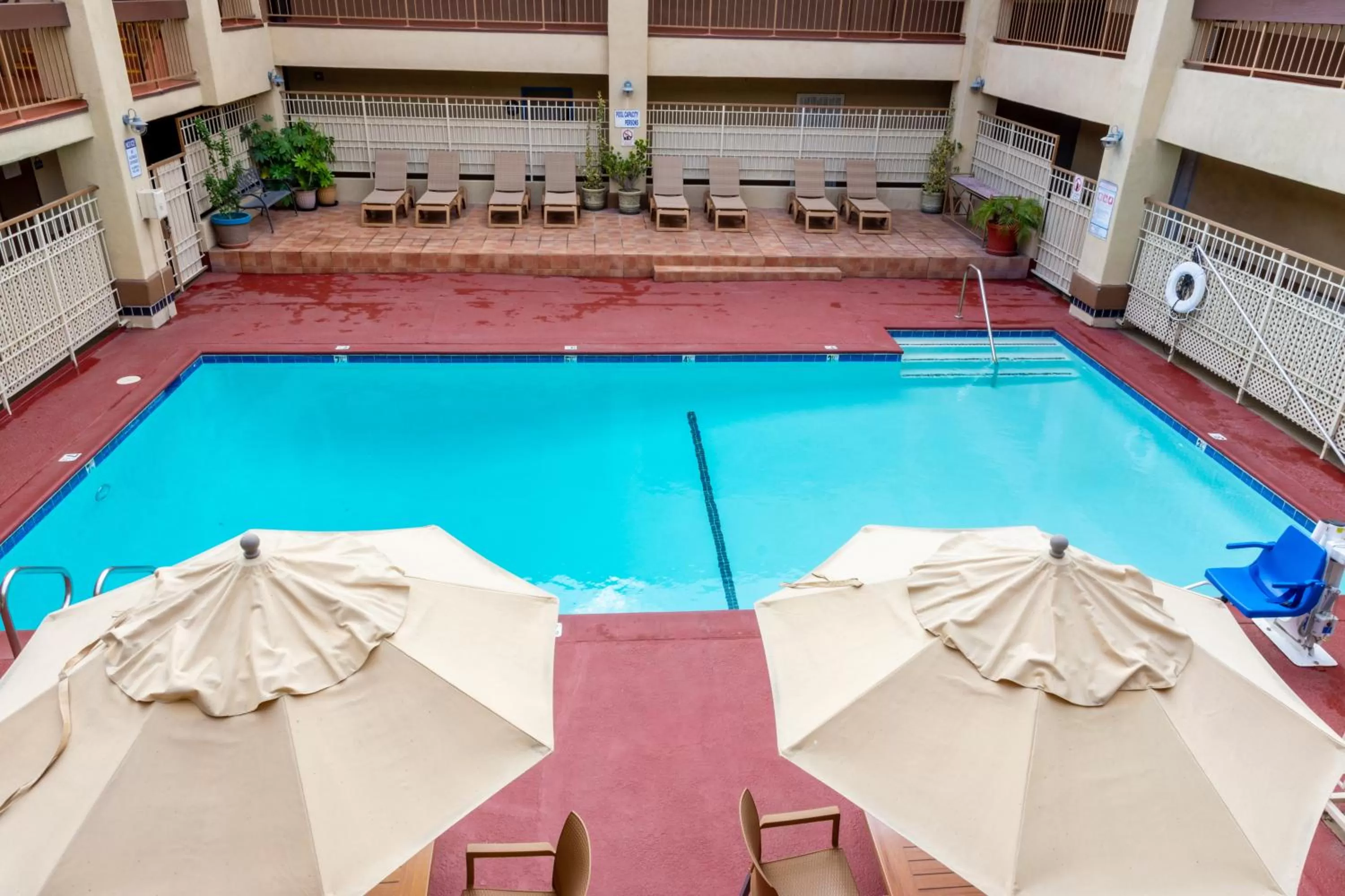 Swimming pool in Days Inn & Suites by Wyndham Artesia