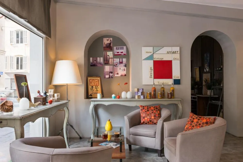 Lobby or reception in Hôtel Edmond Rostand