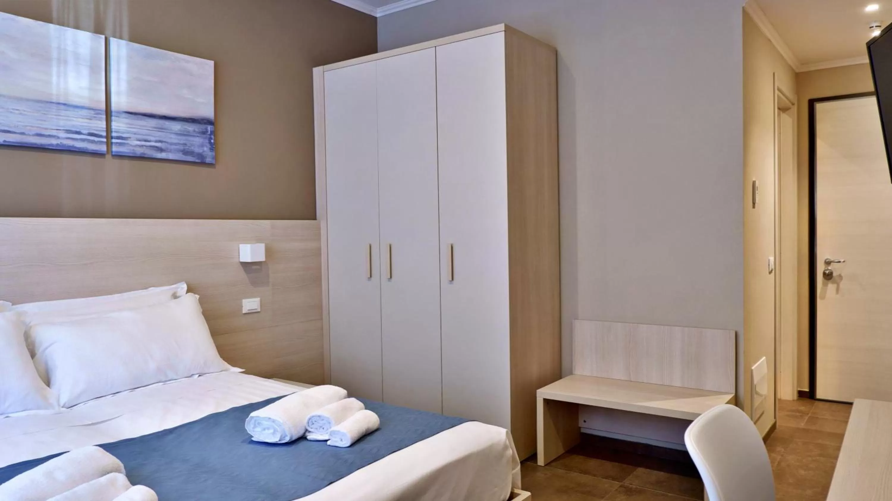 Bed in Pianomare Riviera Apartments and Rooms