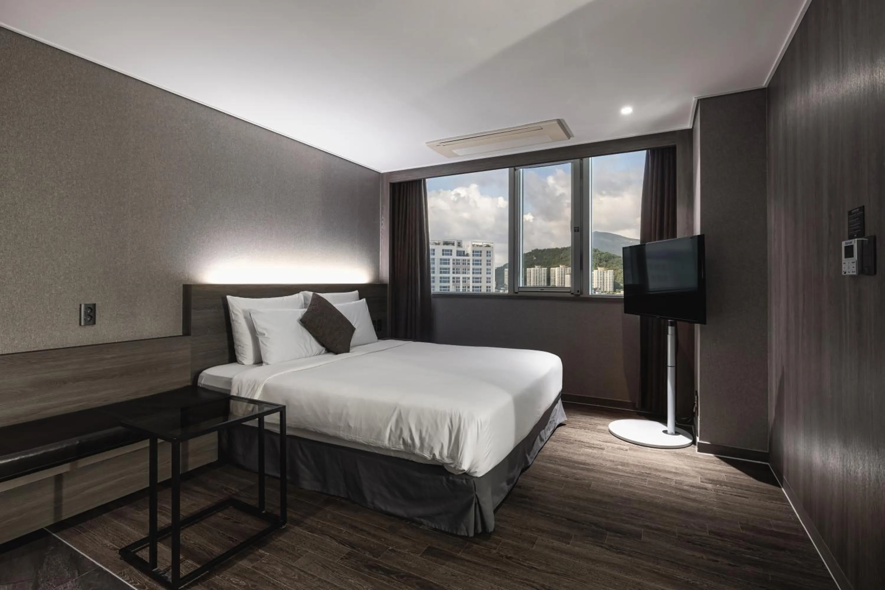 Decorative detail, Bed in Kent Hotel Gwangalli by Kensington