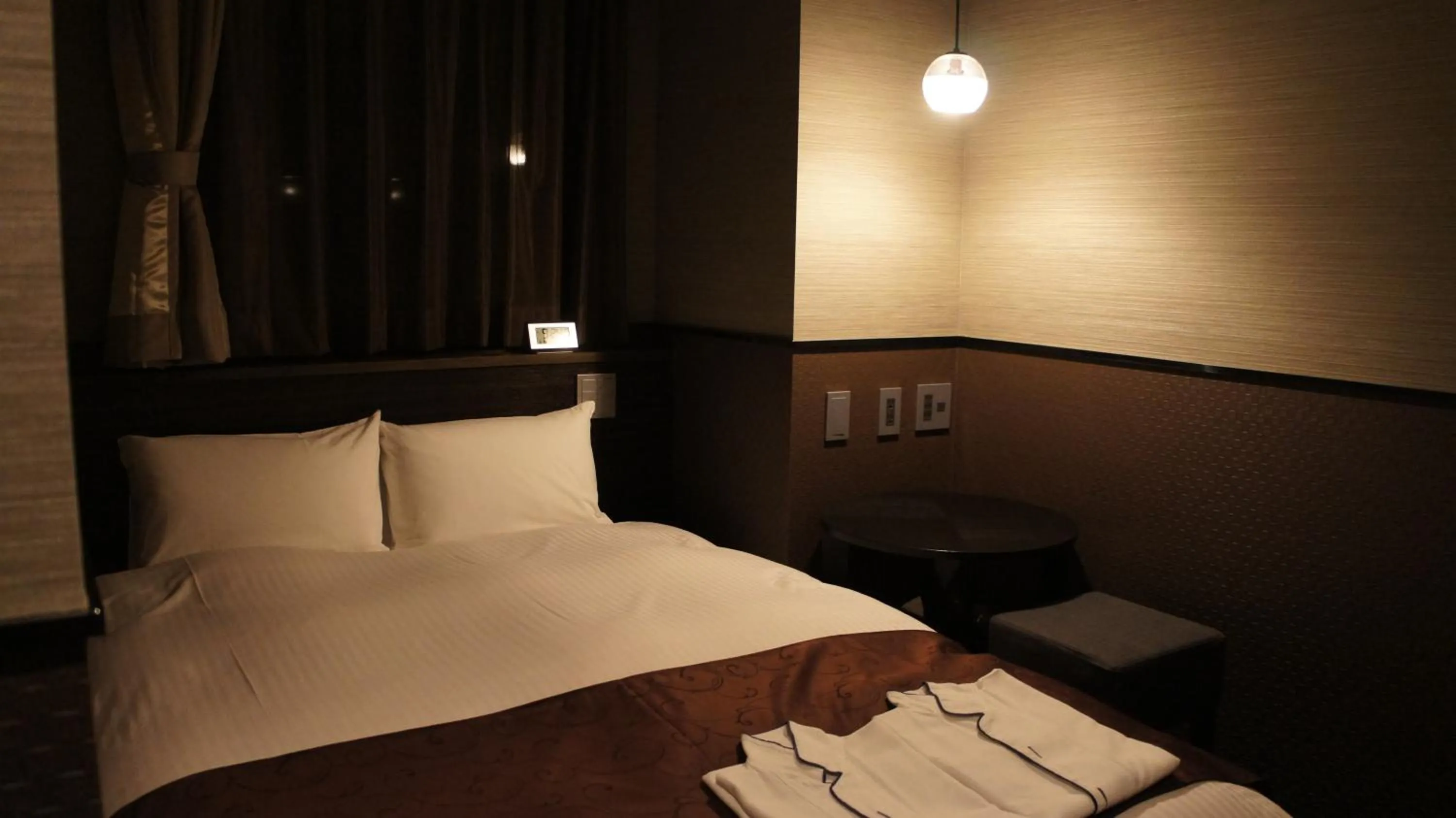 Photo of the whole room, Bed in Hotel SUI Ginza Kyobashi by ABEST