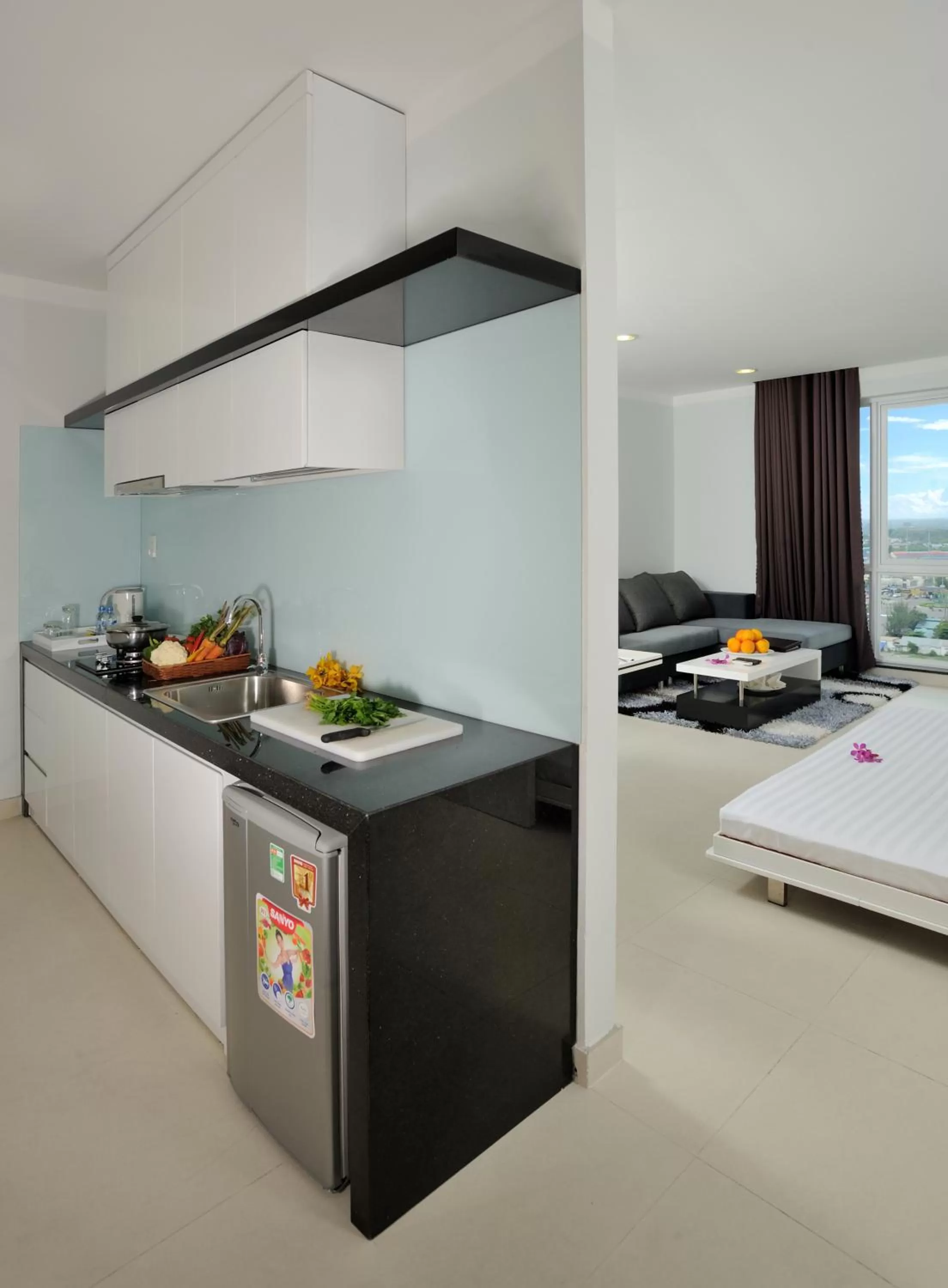 Kitchen or kitchenette in Becamex Hotel Thu Dau Mot
