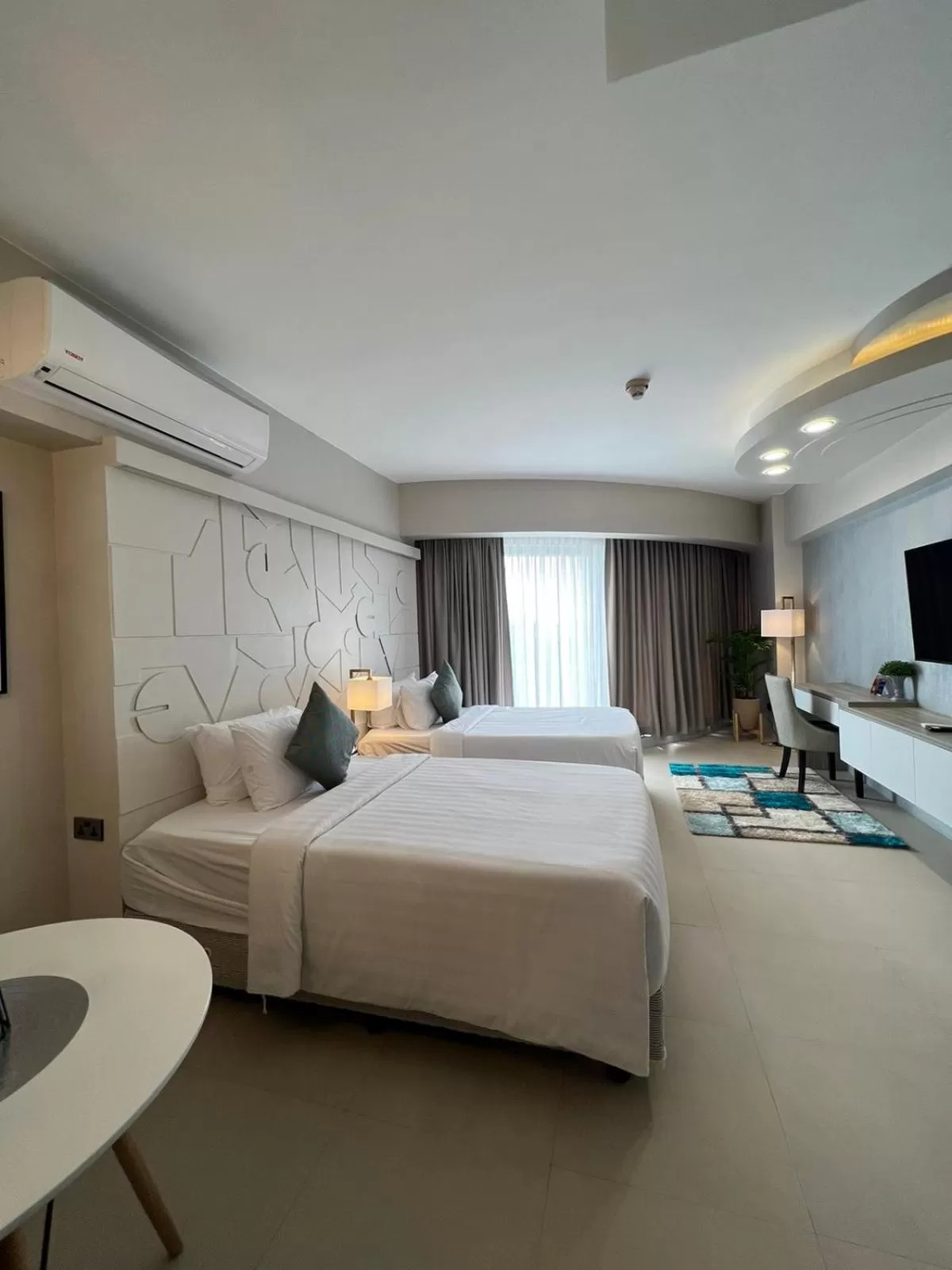 Bedroom, Bed in AEON SUITES Staycation