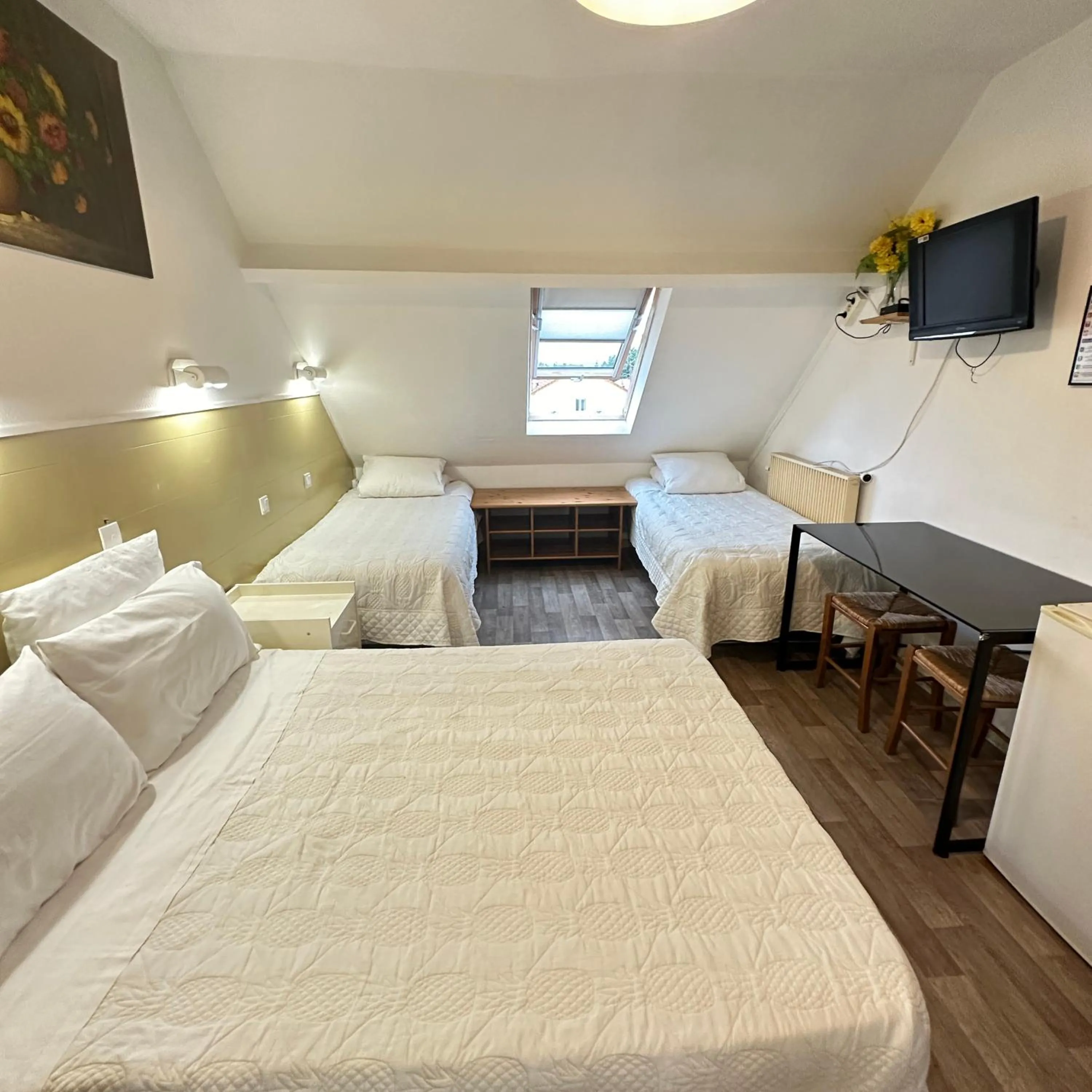 Bed in Hotel Paris Star