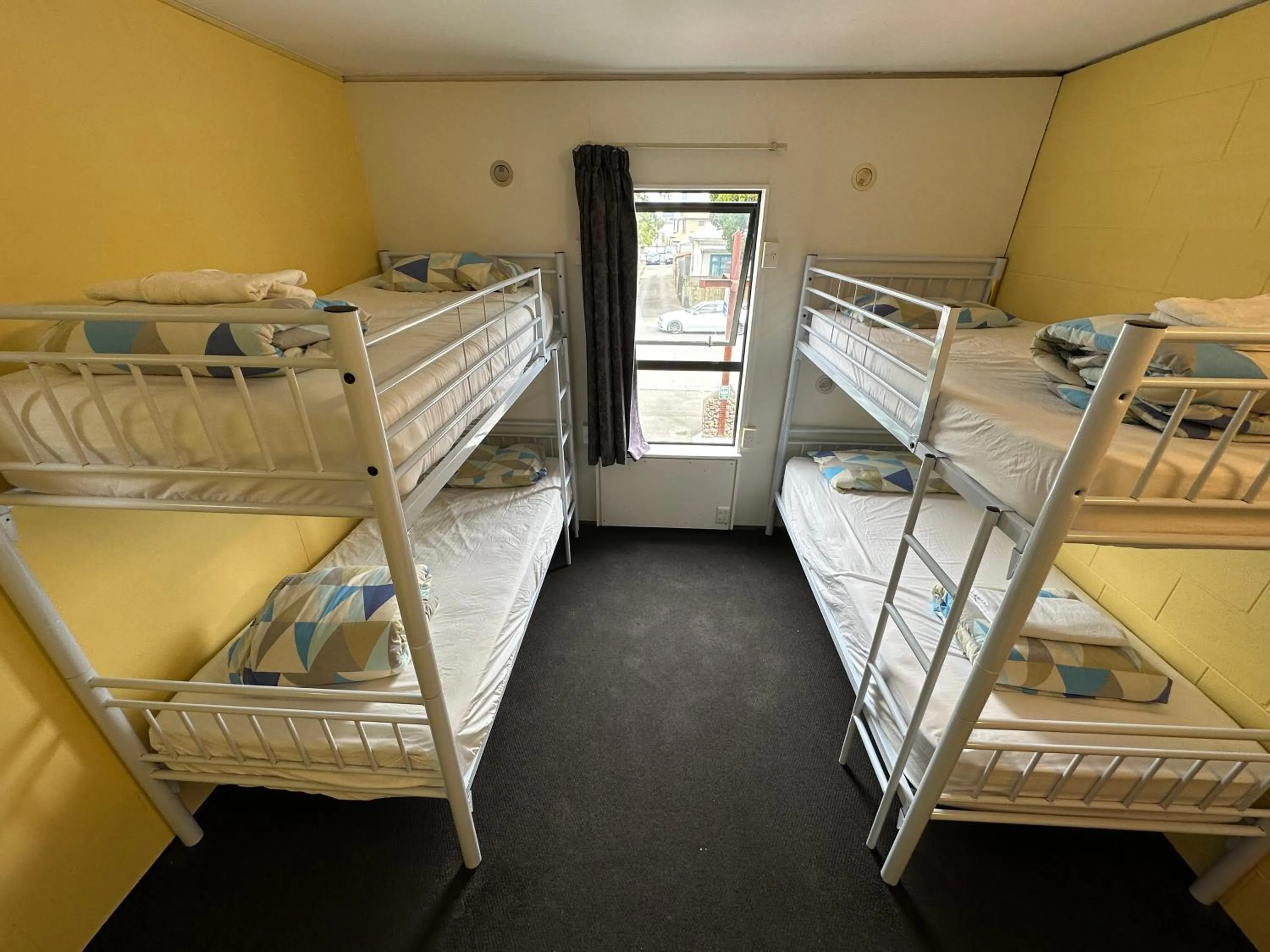 Bed in Around The World Backpackers