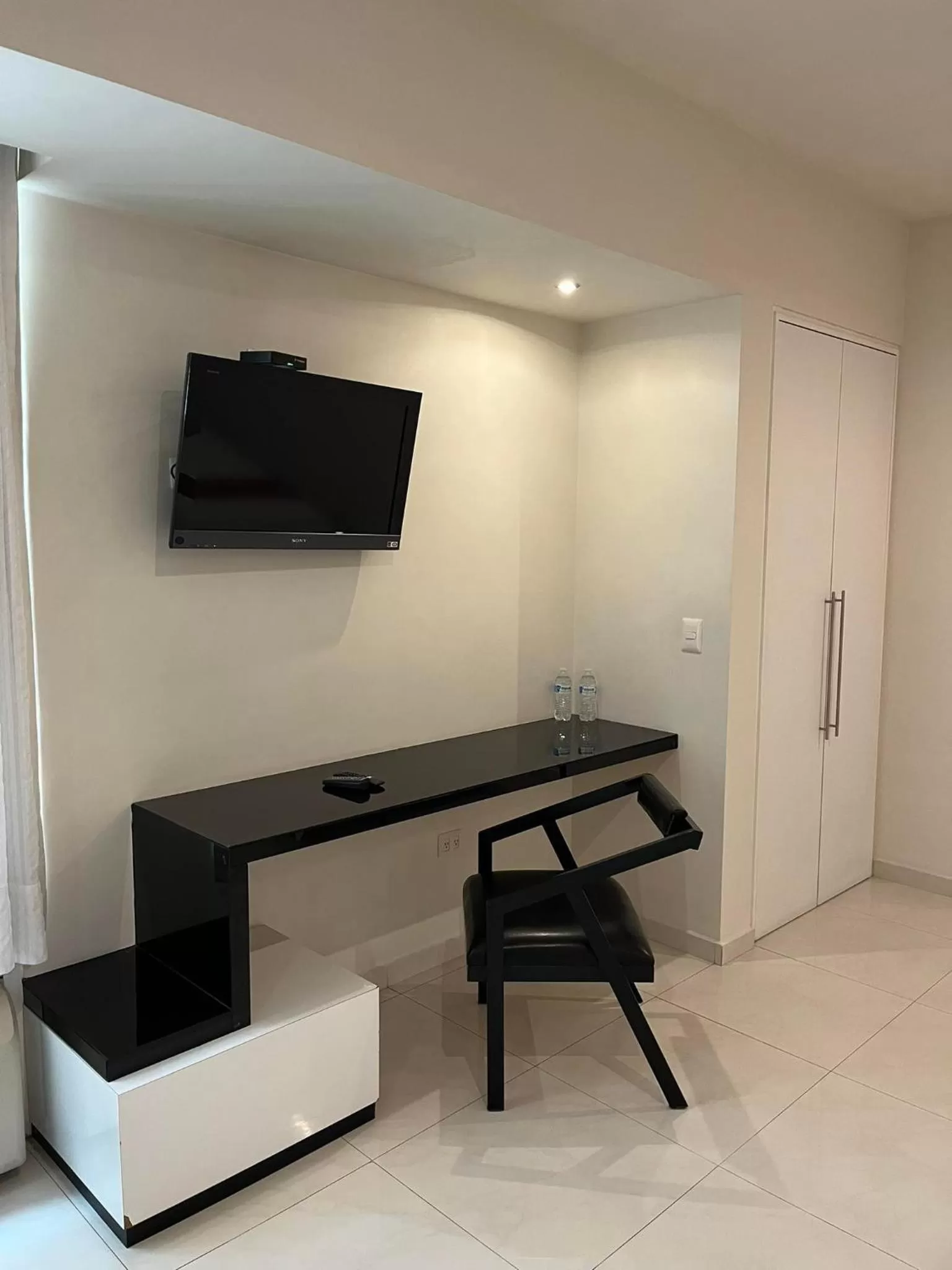 Communal lounge/ TV room in Zújmú Business Boutique Hotel