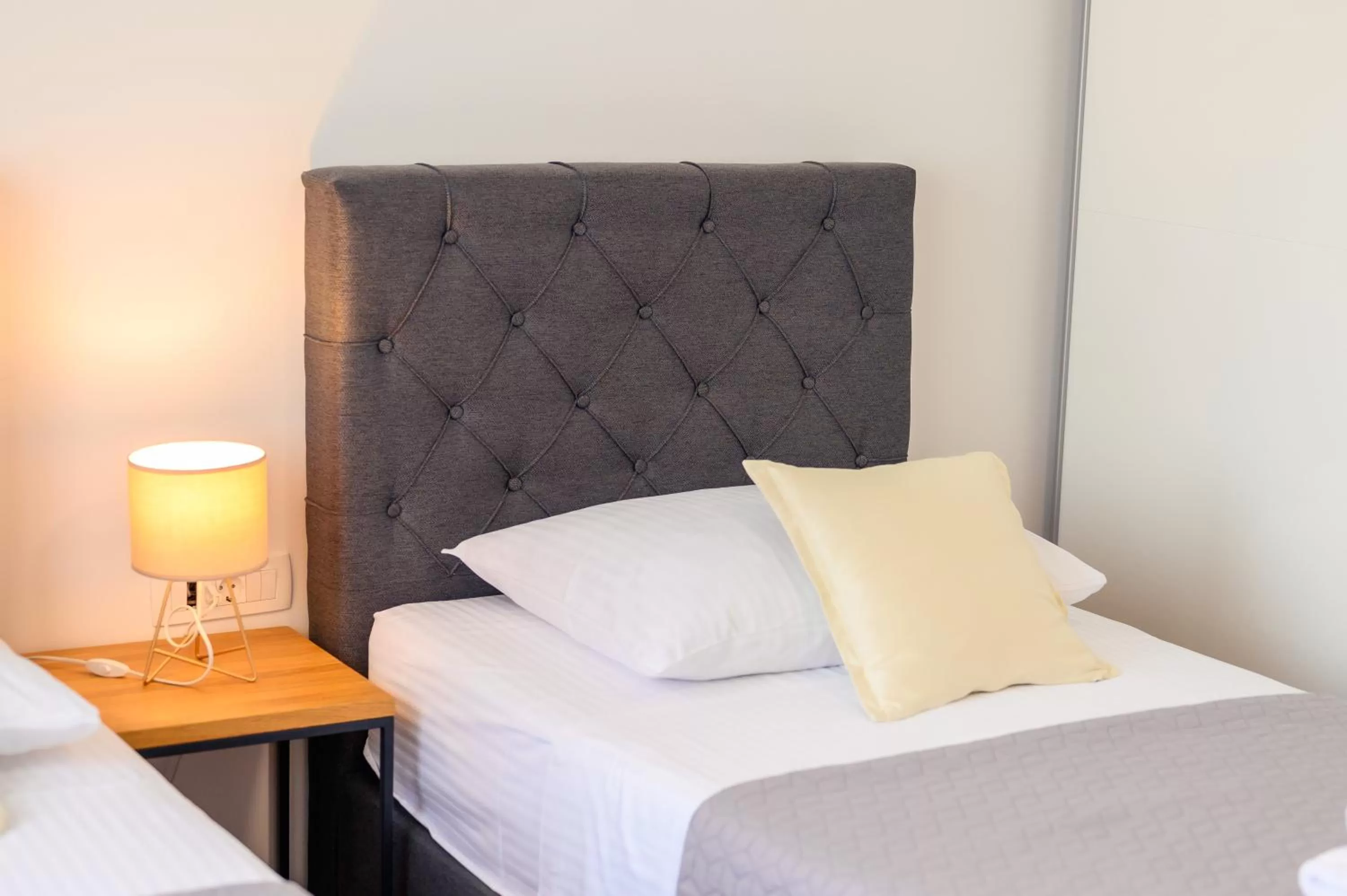 Bed in Boutique rooms Kican