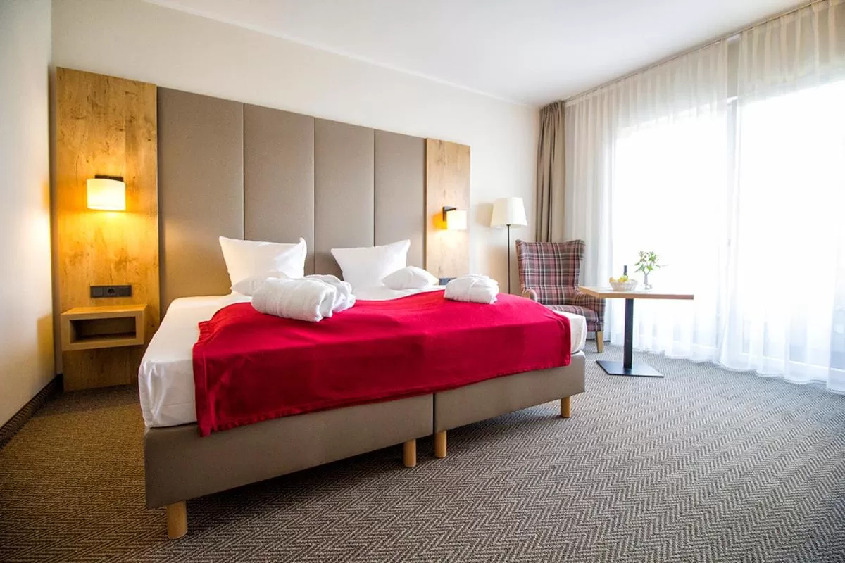 Bed in Santé Royale Hotel- & Gesundheitsresort Warmbad Wolkenstein