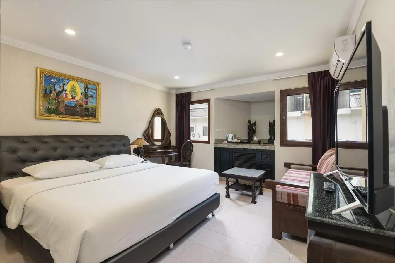 Photo of the whole room, Bed in The Ambiance Hotel