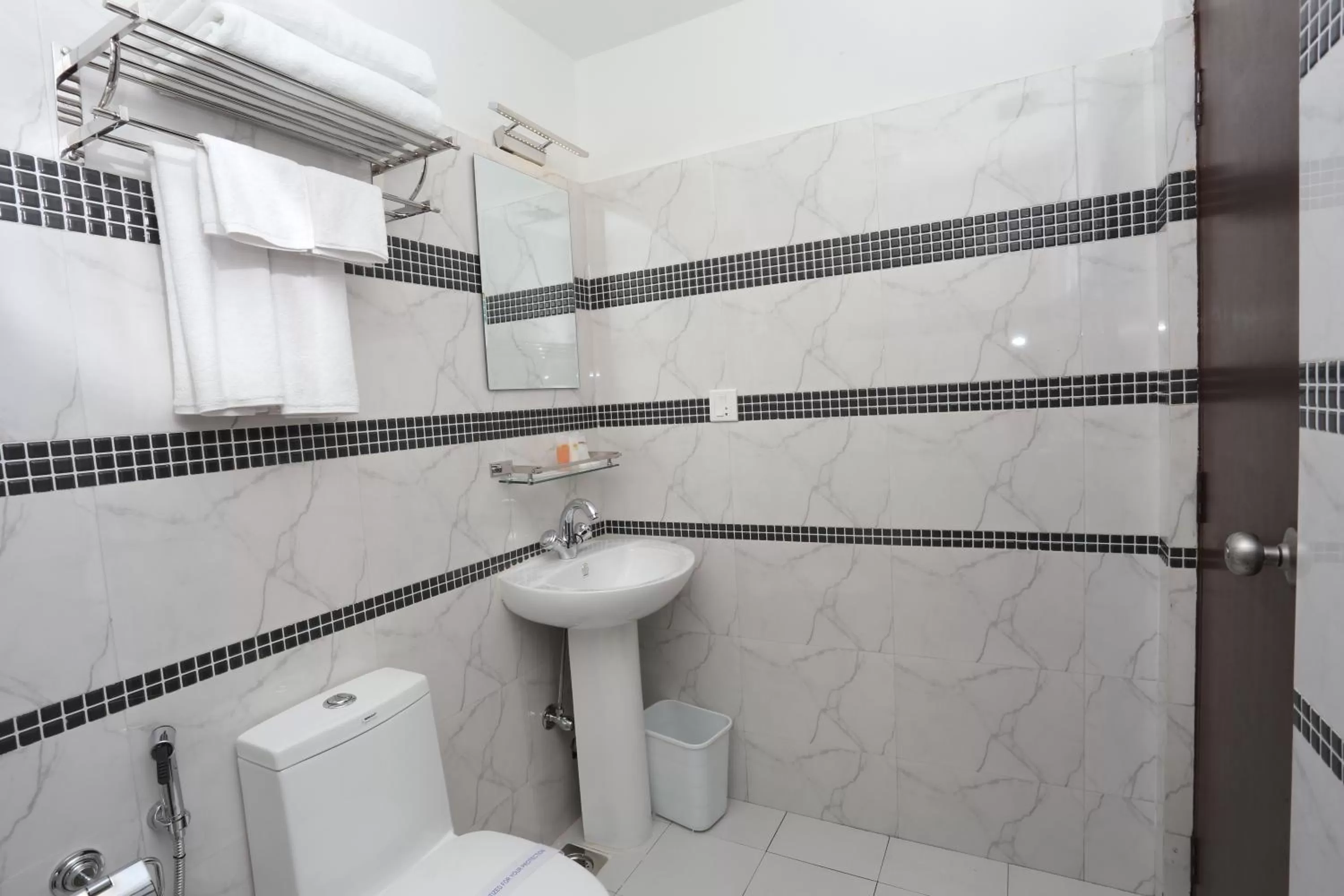 Bathroom in Hotel Jay Suites