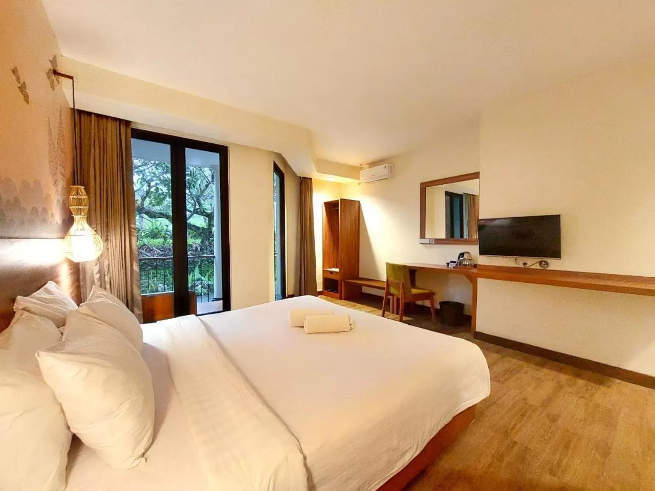 Bed in The Batu Hotel & Villas