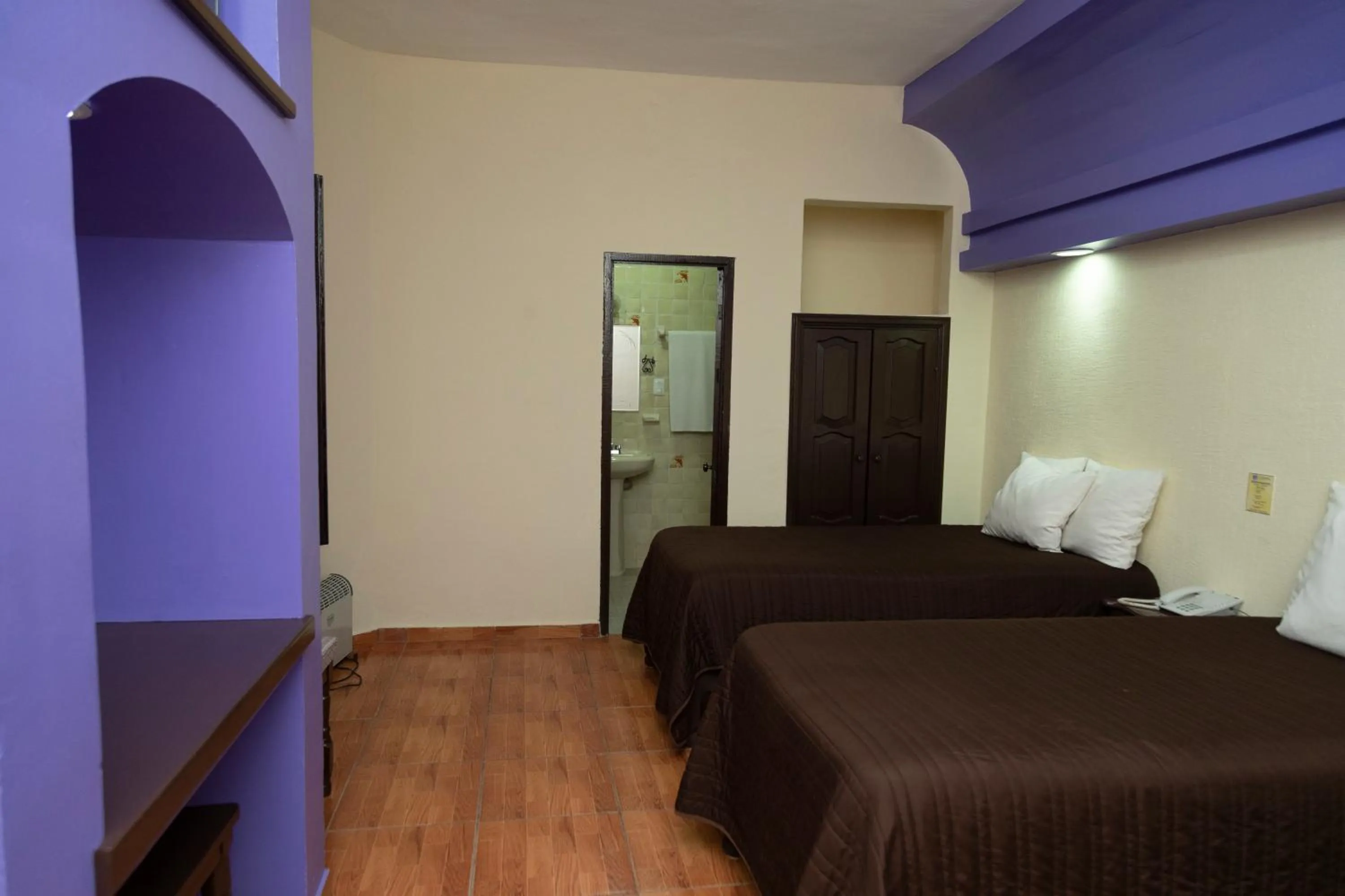 Bed in Hotel D’Monica