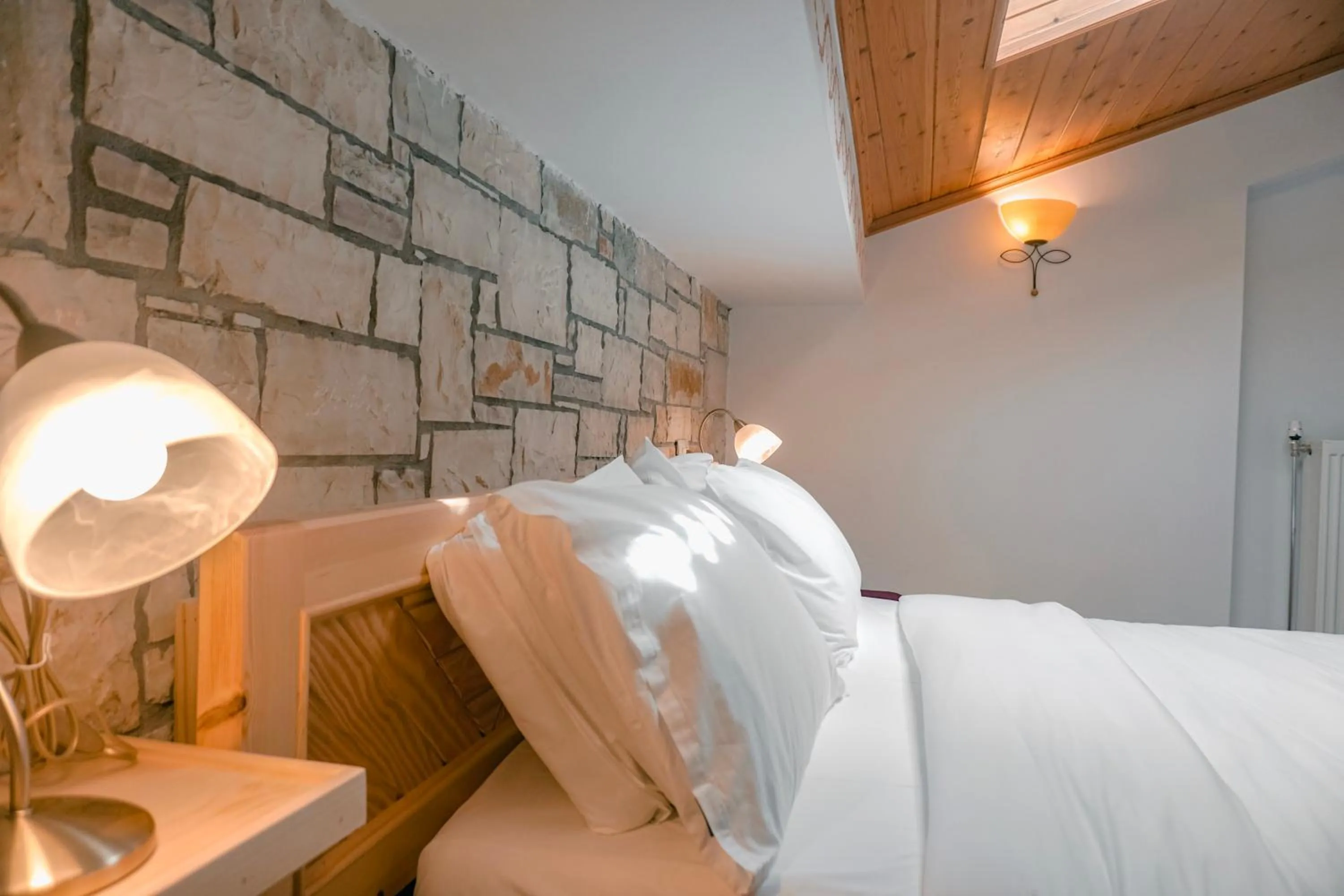 Bed in Hotel Argjiro