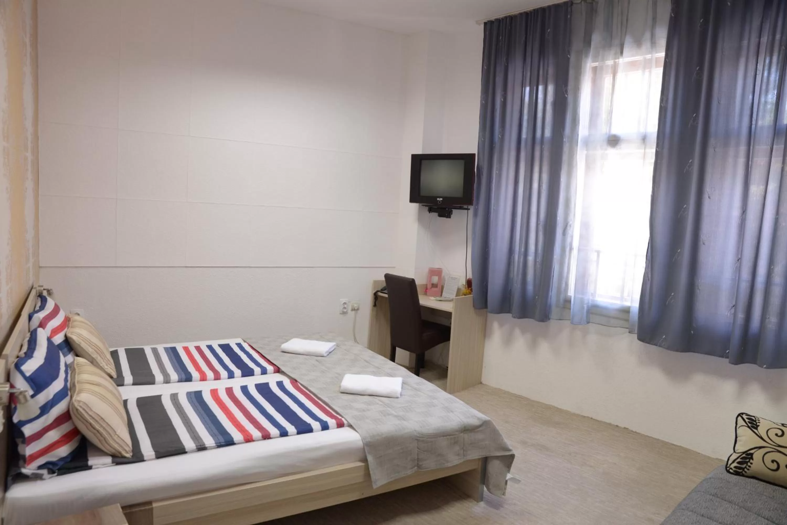 Photo of the whole room, Bed in Guest House GOLDEN COIN