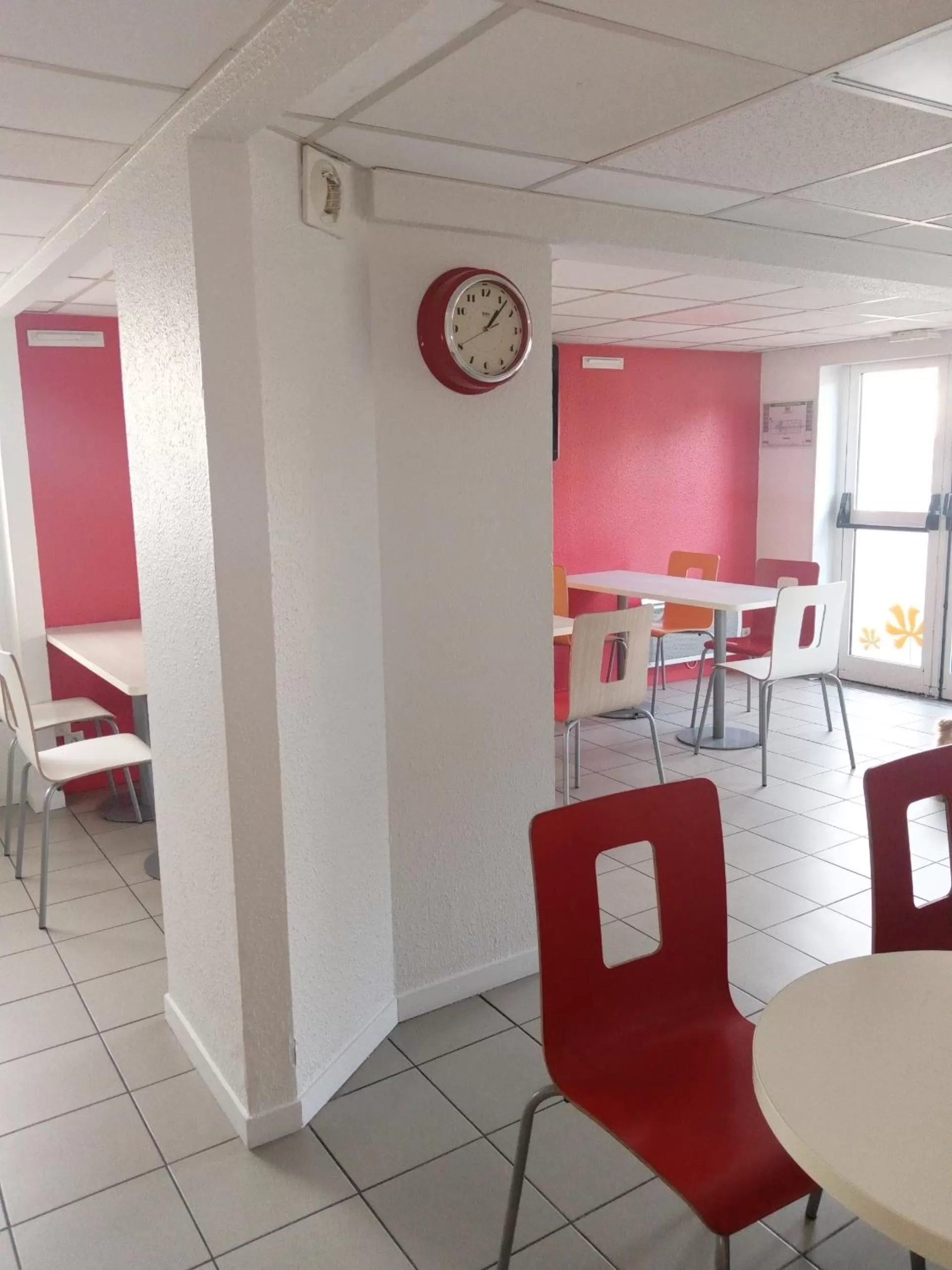 Dining area in Premiere Classe Saint Brice Sous Foret