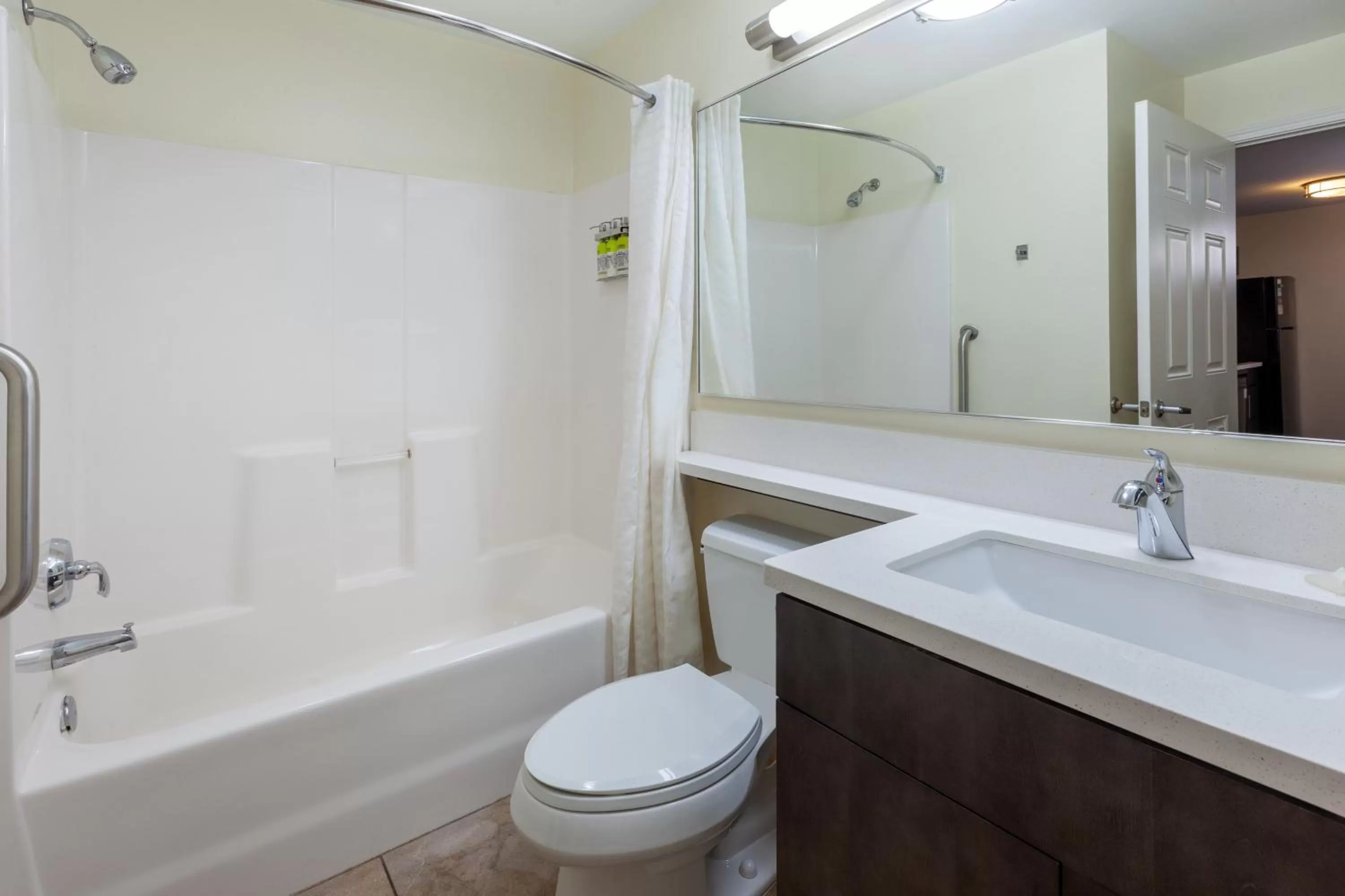 Bathroom in Candlewood Suites Kalamazoo by IHG