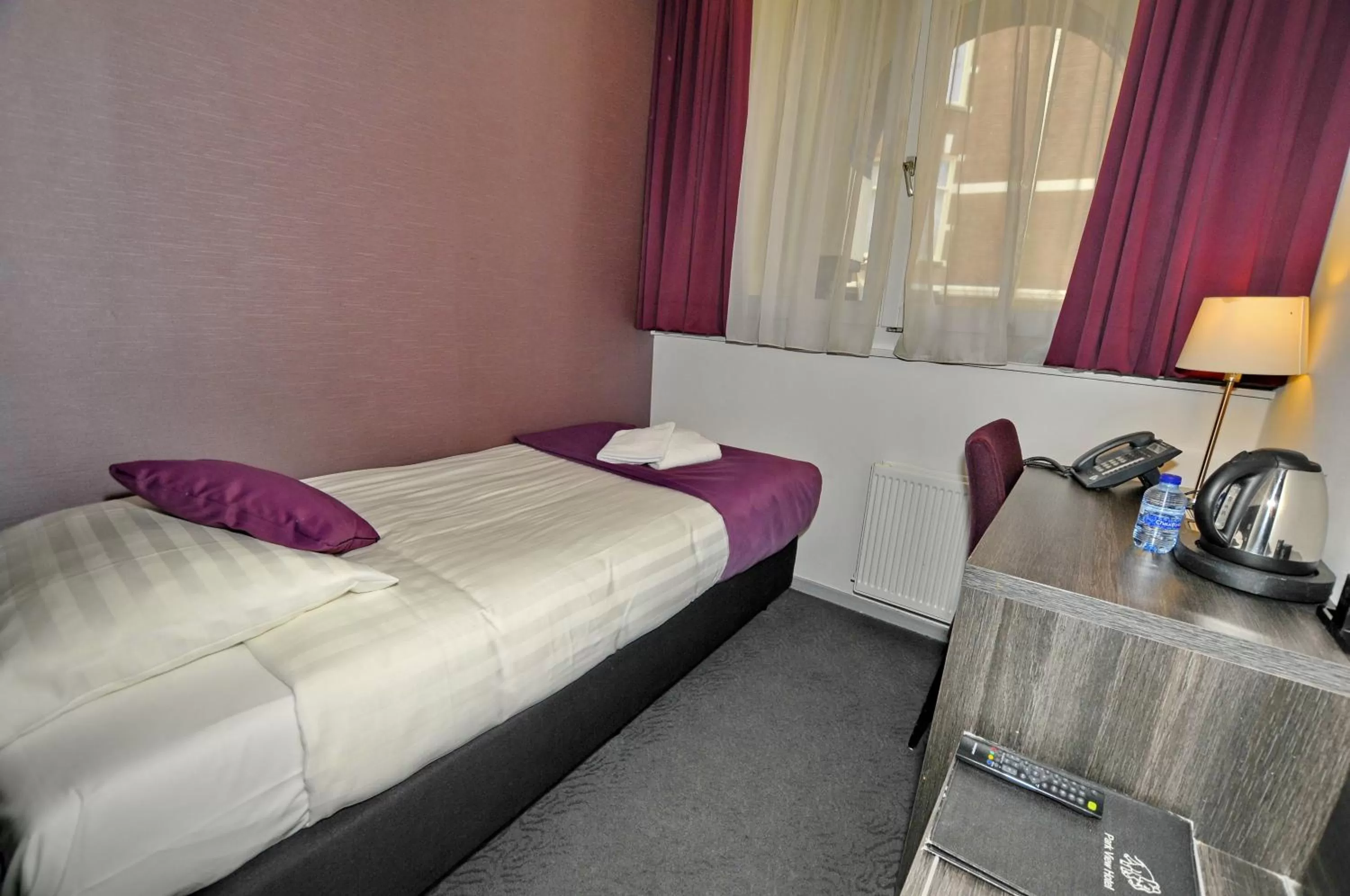 Bed in Hotel Parkview