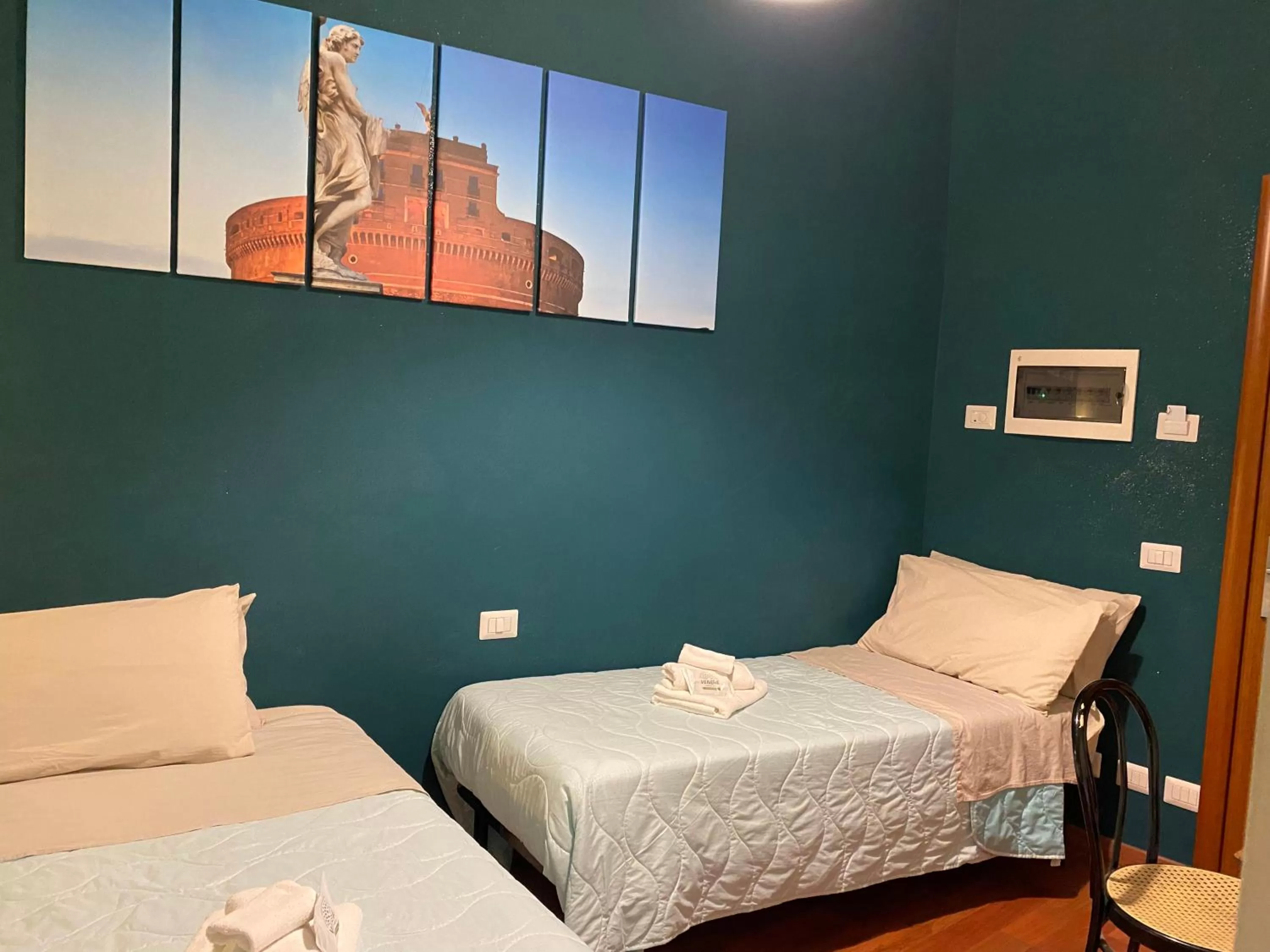 Bed in AmareRomaRooms